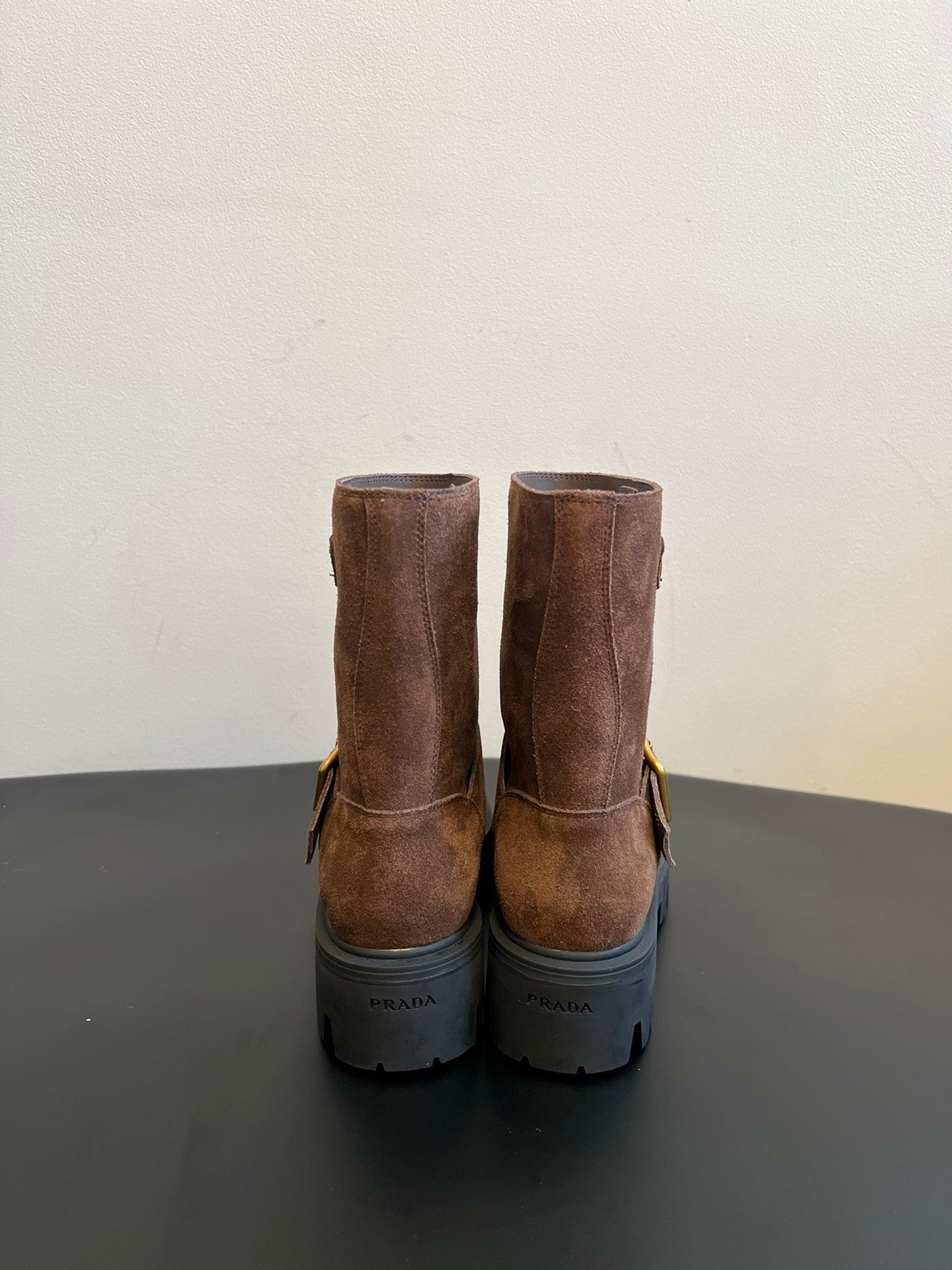 PRADA 25S PLATFORM ANKLE BOOTS IN BROWN SUEDE WITH GOLD HARDWARE