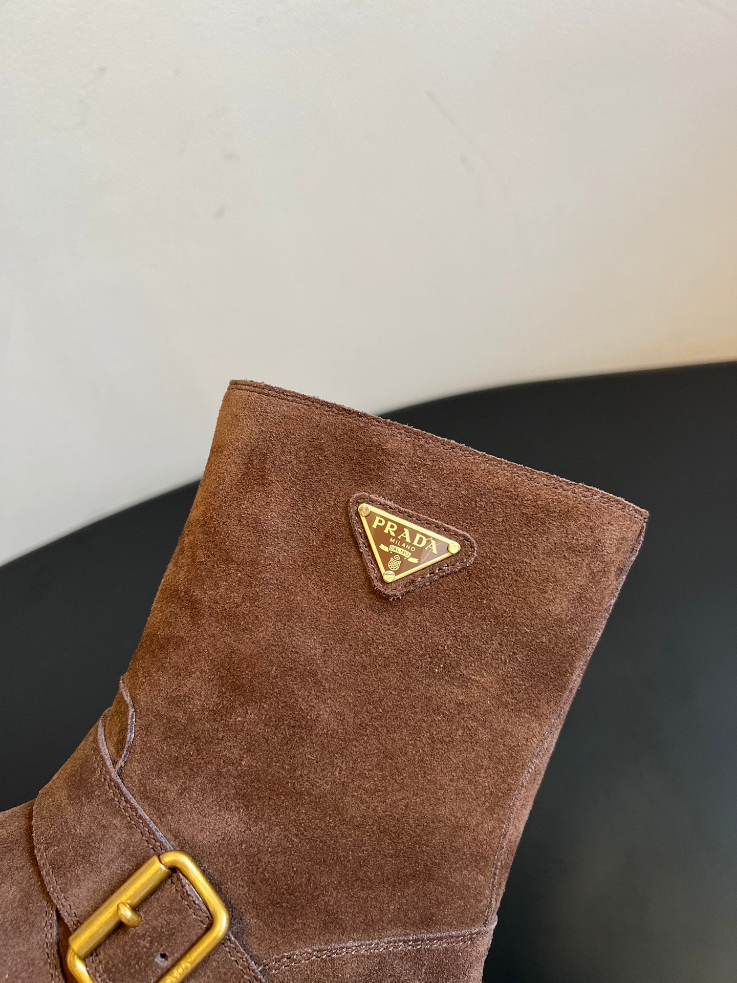 PRADA 25S PLATFORM ANKLE BOOTS IN BROWN SUEDE WITH GOLD HARDWARE
