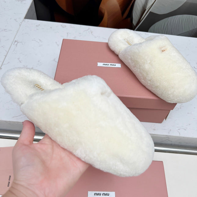 MIUMIU 26S MULES IN CREAM WHITE SHEARLING
