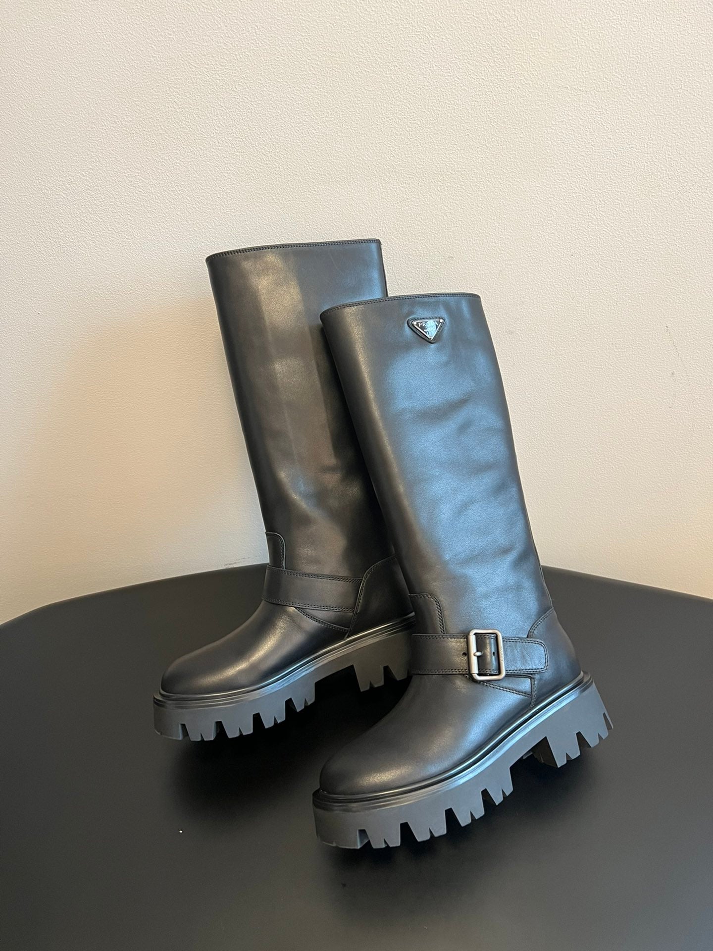 PRADA 25S HIGH-CUT PLATFORM BOOTS IN BLACK CALFSKIN WITH SILVER HARDWARE
