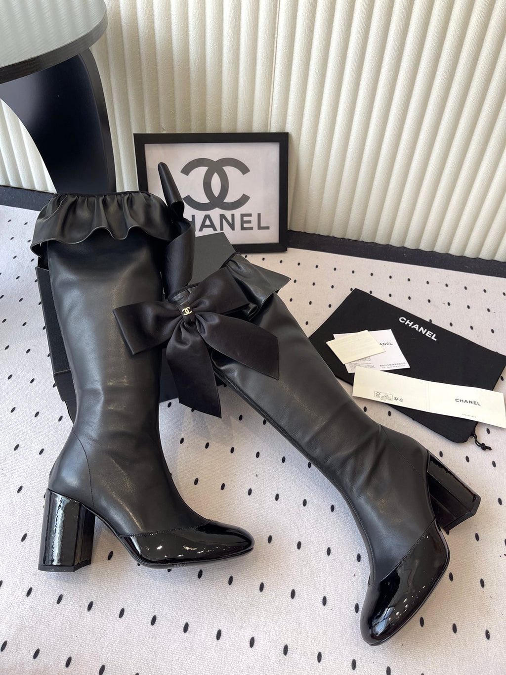 CHANEL BOW HIGH BOOTS IN BLACK CALFSKIN