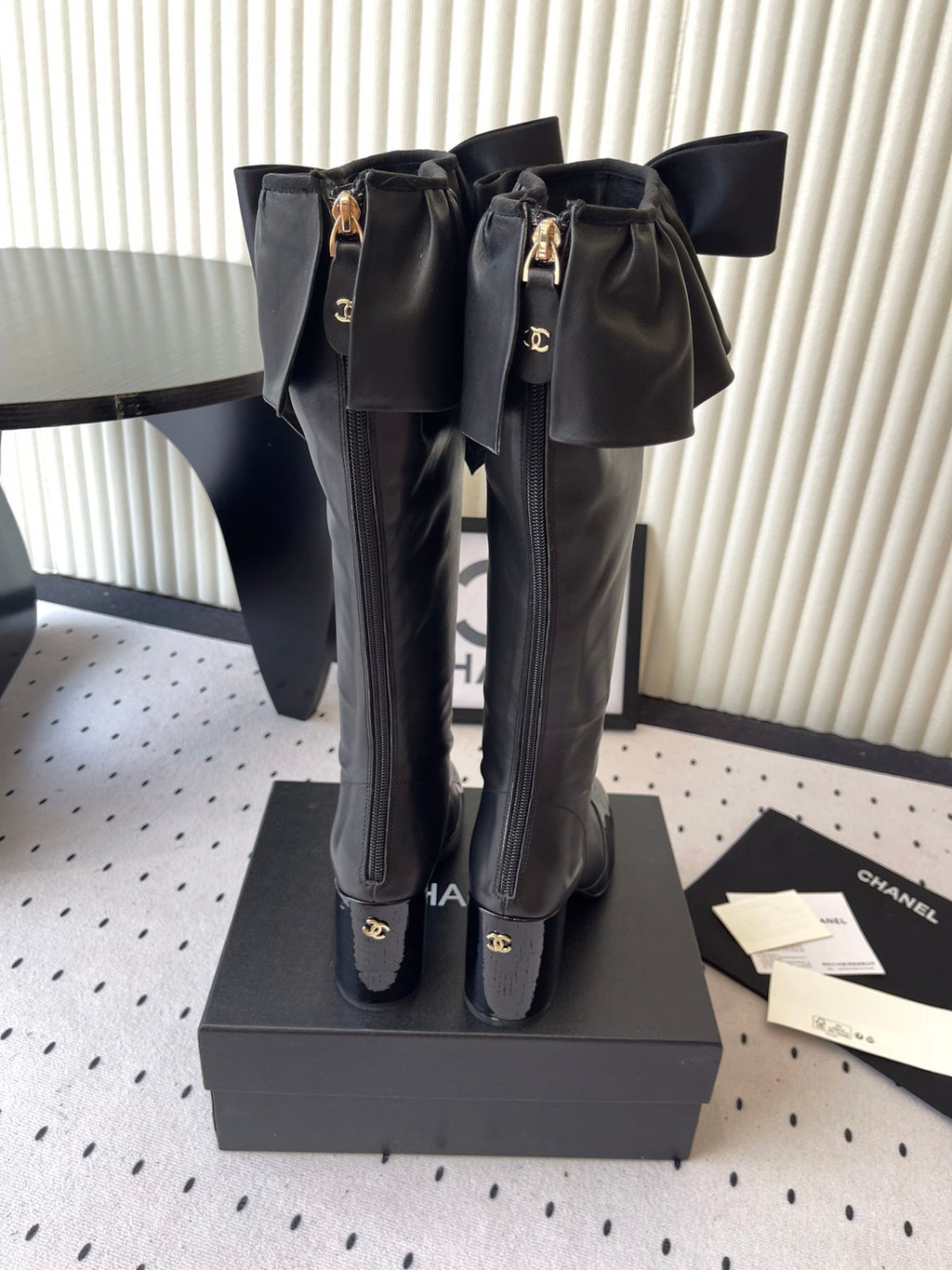 CHANEL BOW HIGH BOOTS IN BLACK CALFSKIN
