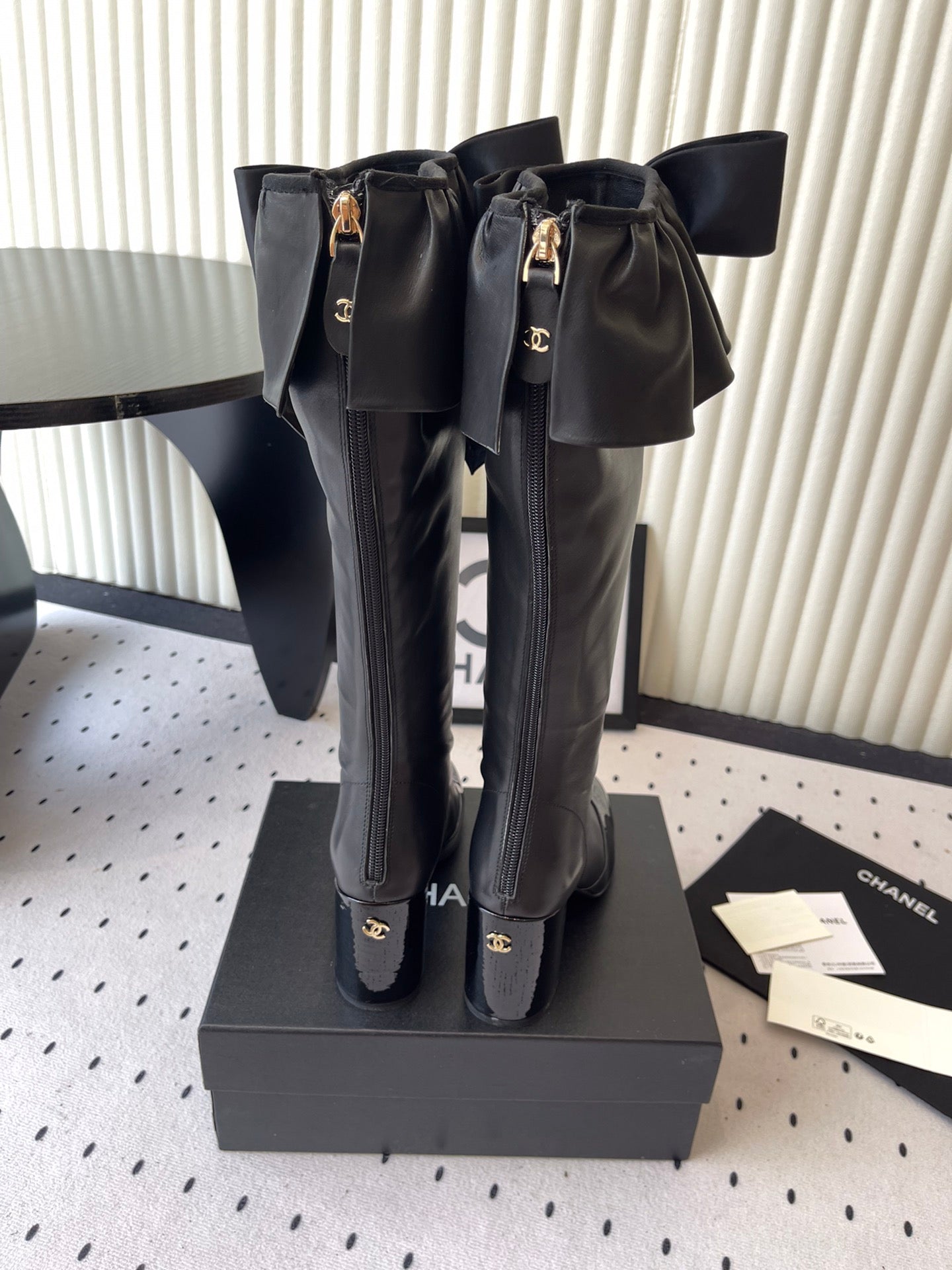 CHANEL BOW HIGH BOOTS IN BLACK CALFSKIN