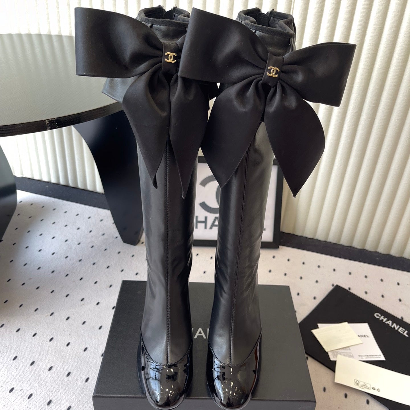 CHANEL BOW HIGH BOOTS IN BLACK CALFSKIN