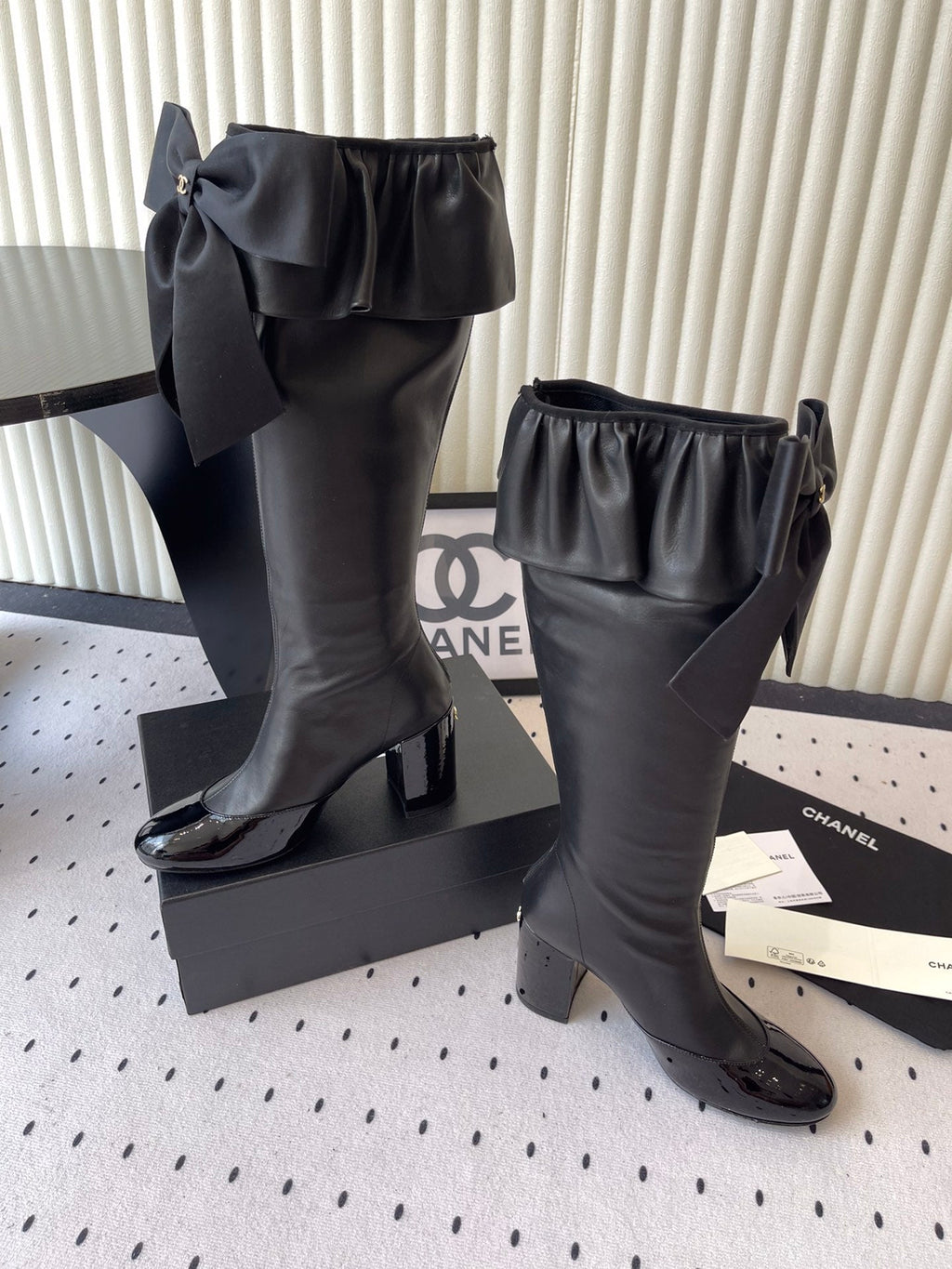 CHANEL BOW HIGH BOOTS IN BLACK CALFSKIN
