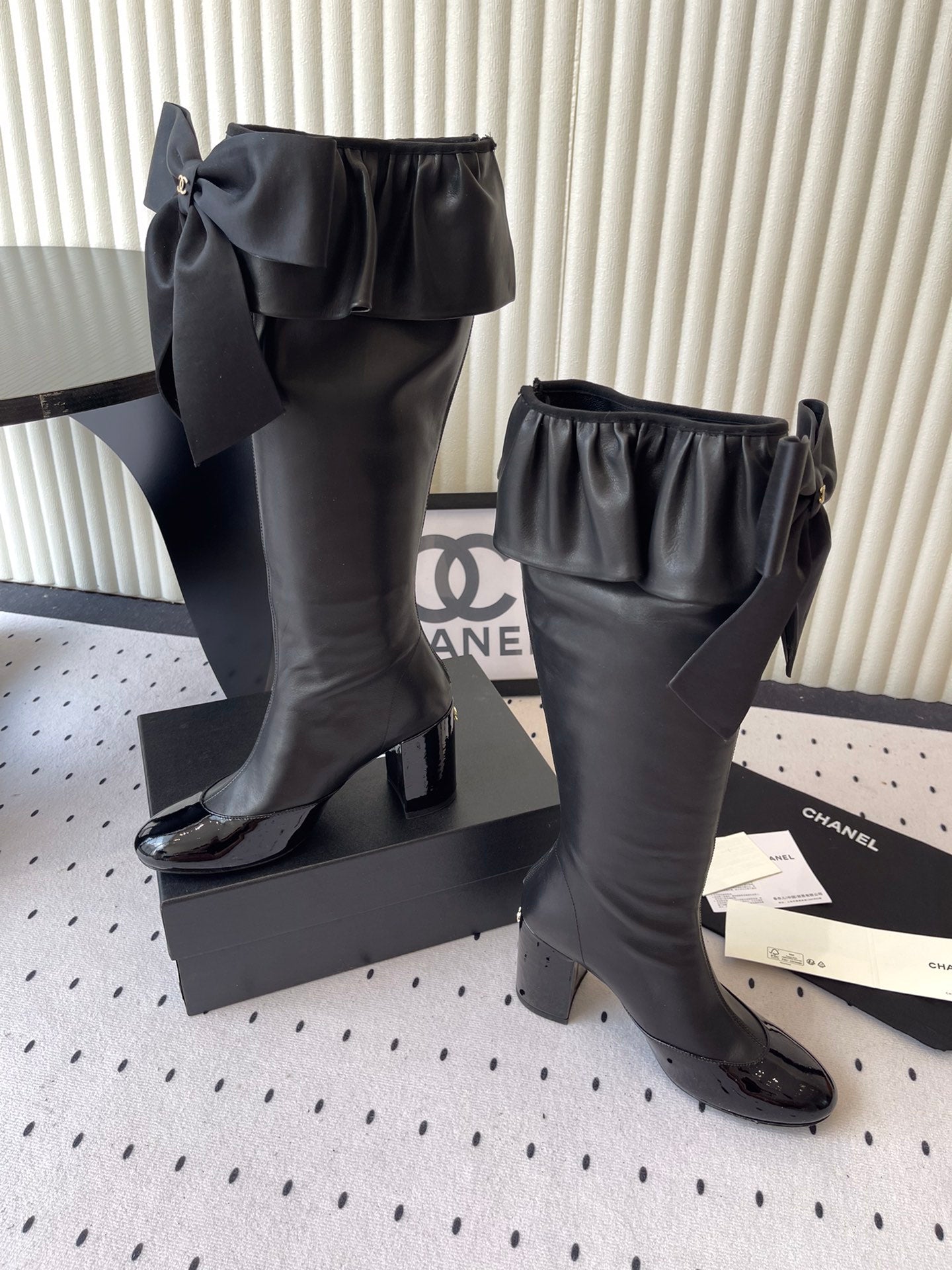 CHANEL BOW HIGH BOOTS IN BLACK CALFSKIN