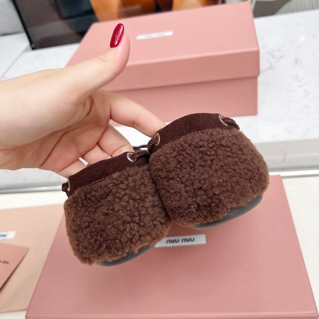 MIUMIU 26S BOAT LOAFERS IN DARK BROWN SHEARLING