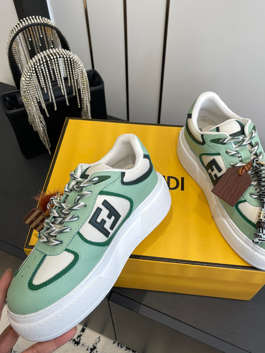 FENDI 25S SNEAKERS 50 MM IN SOFT SAGE GREEN SYNTHETIC LEATHER WITH CHARM