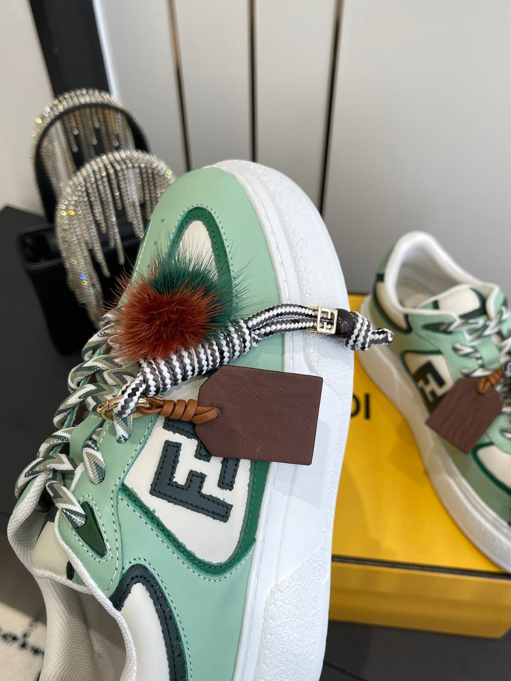 FENDI 25S SNEAKERS 50 MM IN SOFT SAGE GREEN SYNTHETIC LEATHER WITH CHARM