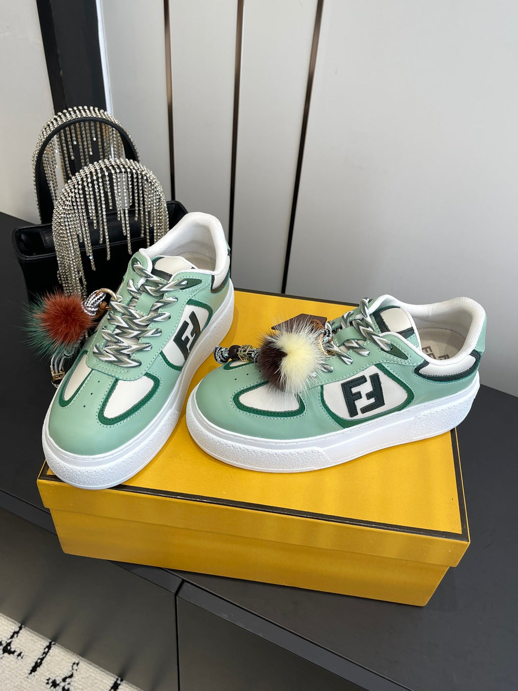 FENDI 25S SNEAKERS 50 MM IN SOFT SAGE GREEN SYNTHETIC LEATHER WITH CHARM