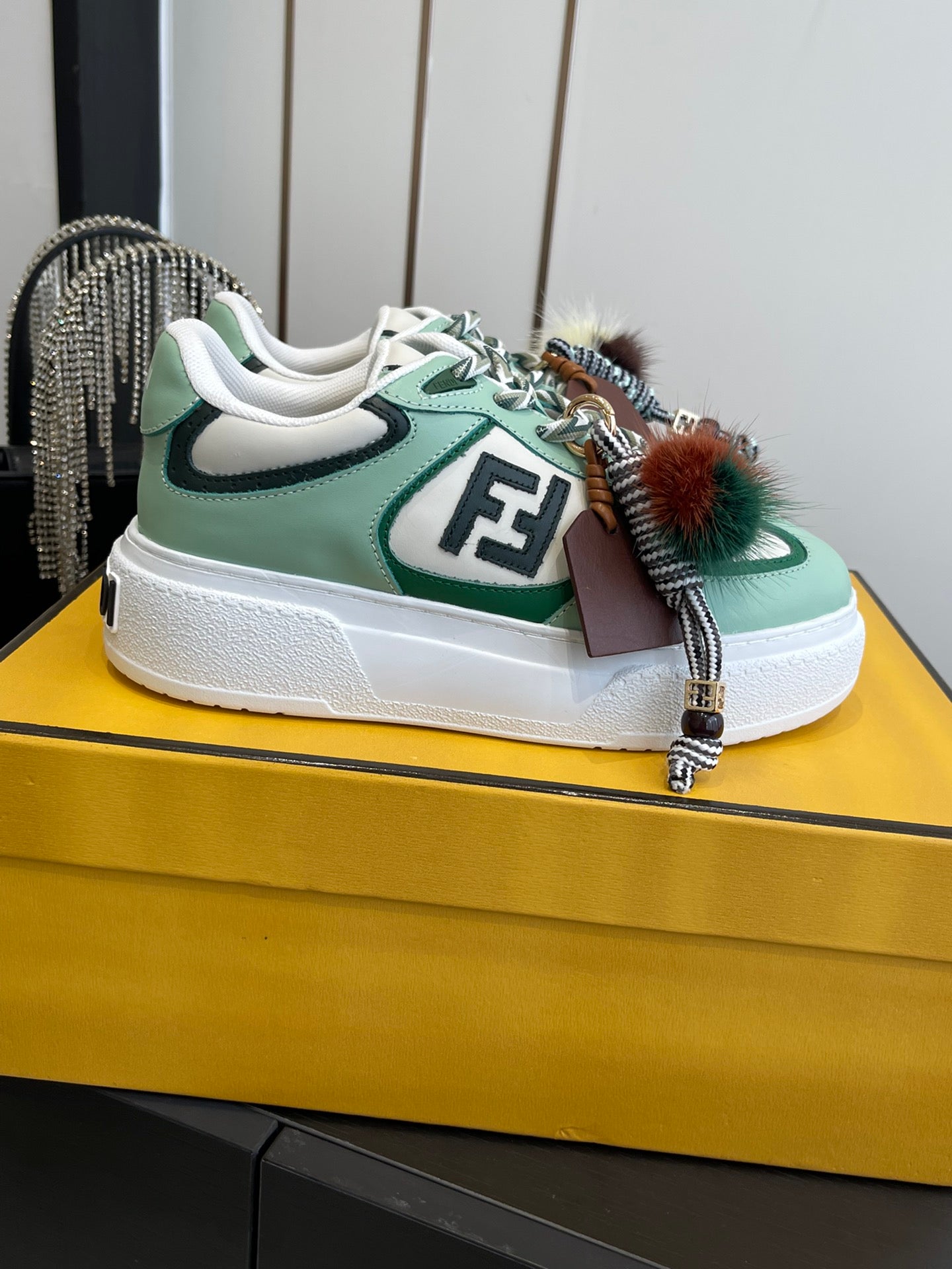 FENDI 25S SNEAKERS 50 MM IN SOFT SAGE GREEN SYNTHETIC LEATHER WITH CHARM