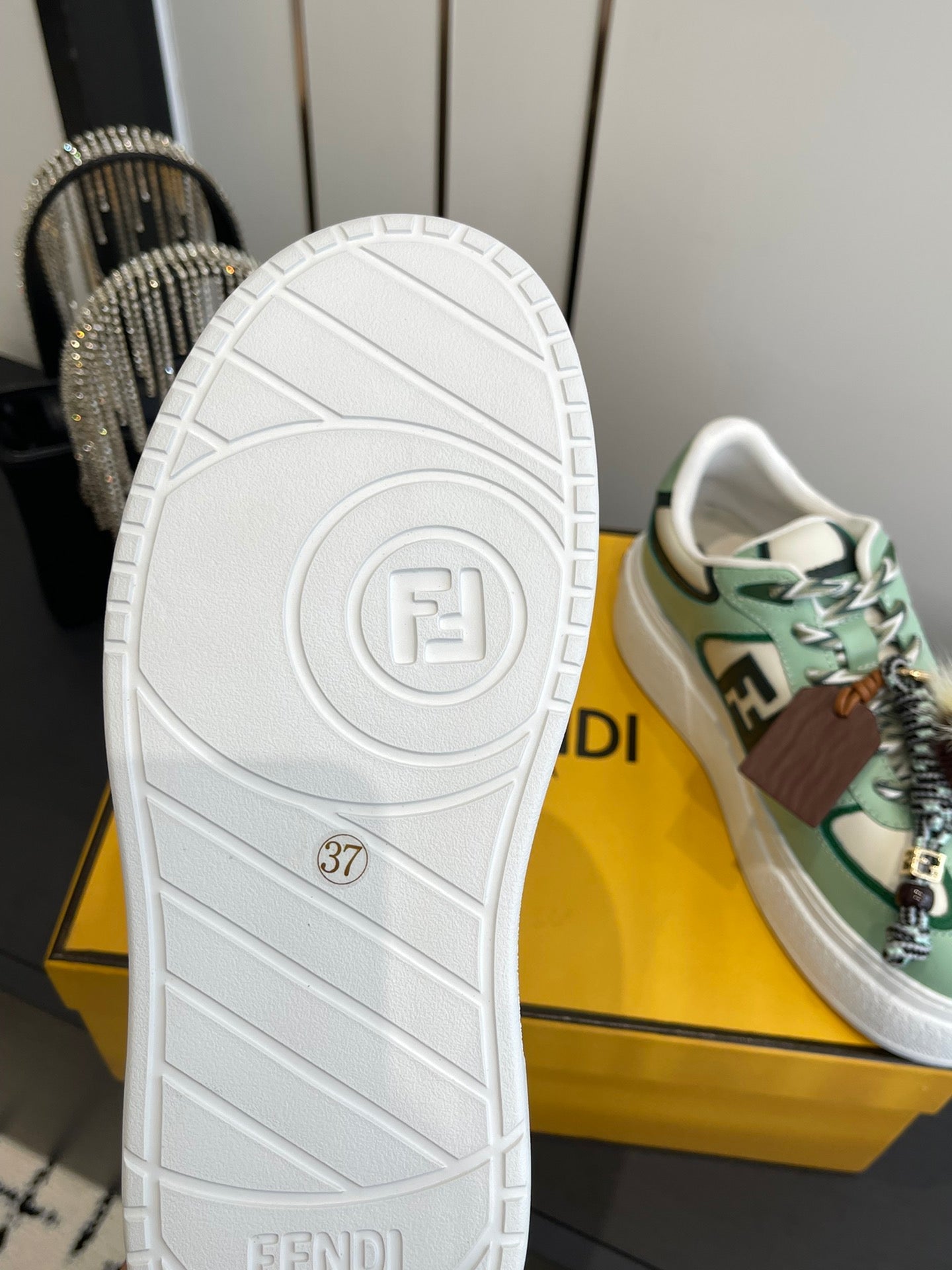 FENDI 25S SNEAKERS 50 MM IN SOFT SAGE GREEN SYNTHETIC LEATHER WITH CHARM