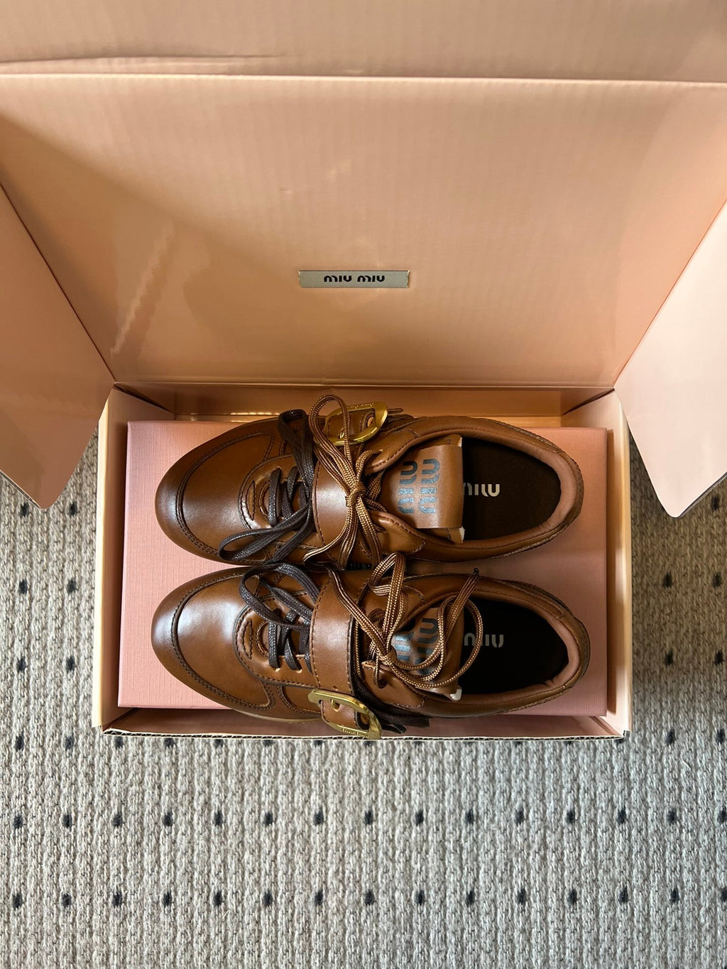 MIUMIU 26S GYMNASIUM SNEAKER IN COGNAC BROWN CALFSKIN WITH GOLD BUCKLED STRAP