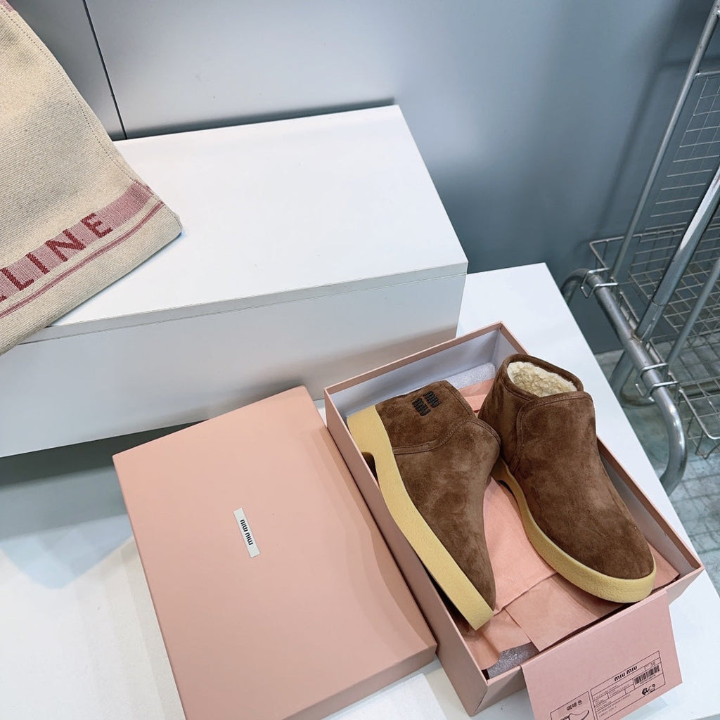 MIUMIU 25S SLIP-ON BOOTIES IN DARK BROWN SUEDE AND SHEARLING