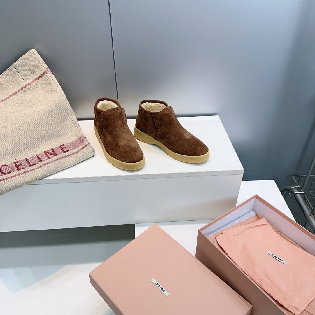 MIUMIU 25S SLIP-ON BOOTIES IN DARK BROWN SUEDE AND SHEARLING
