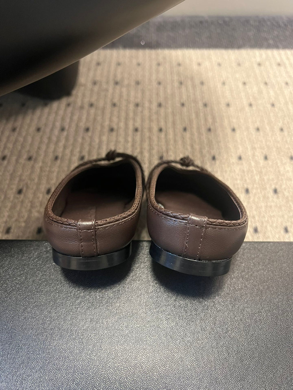 BOTTEGA VENETA 26S FLAT MULES IN DARK BROWN LAMBSKIN
