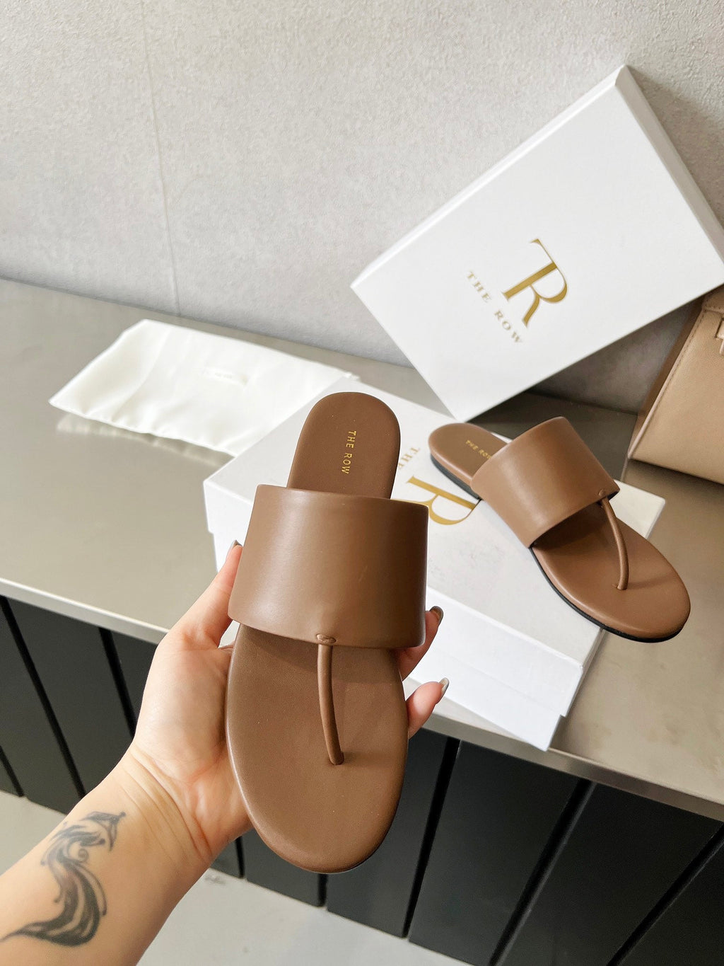 THE ROW 26S FLAT THONG SANDALS IN BROWN CALFSKIN