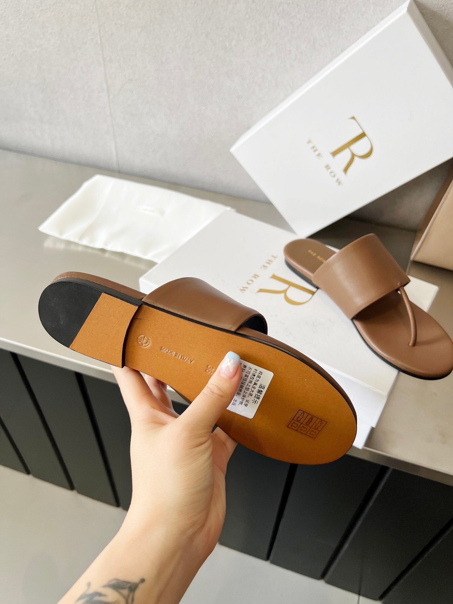 THE ROW 26S FLAT THONG SANDALS IN BROWN CALFSKIN