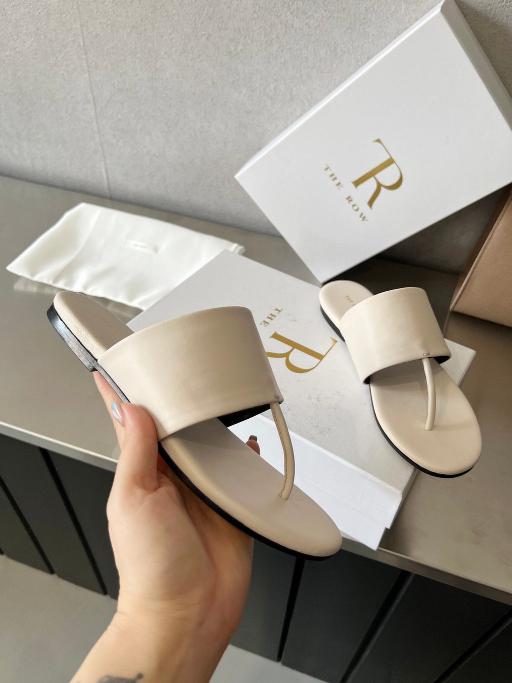 THE ROW 26S FLAT THONG SANDALS IN WHITE CALFSKIN