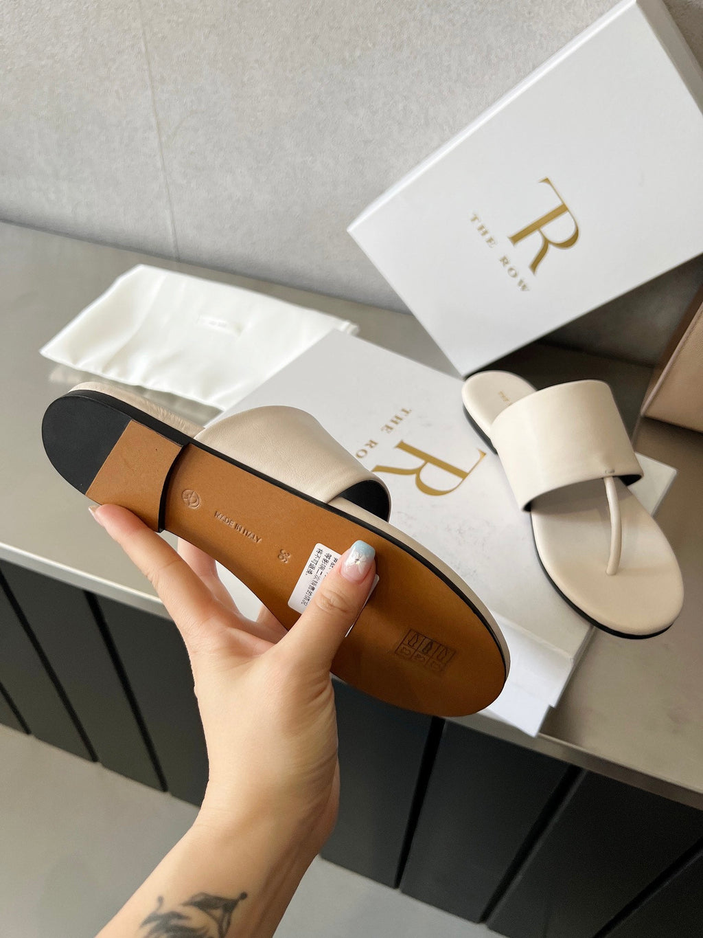 THE ROW 26S FLAT THONG SANDALS IN WHITE CALFSKIN