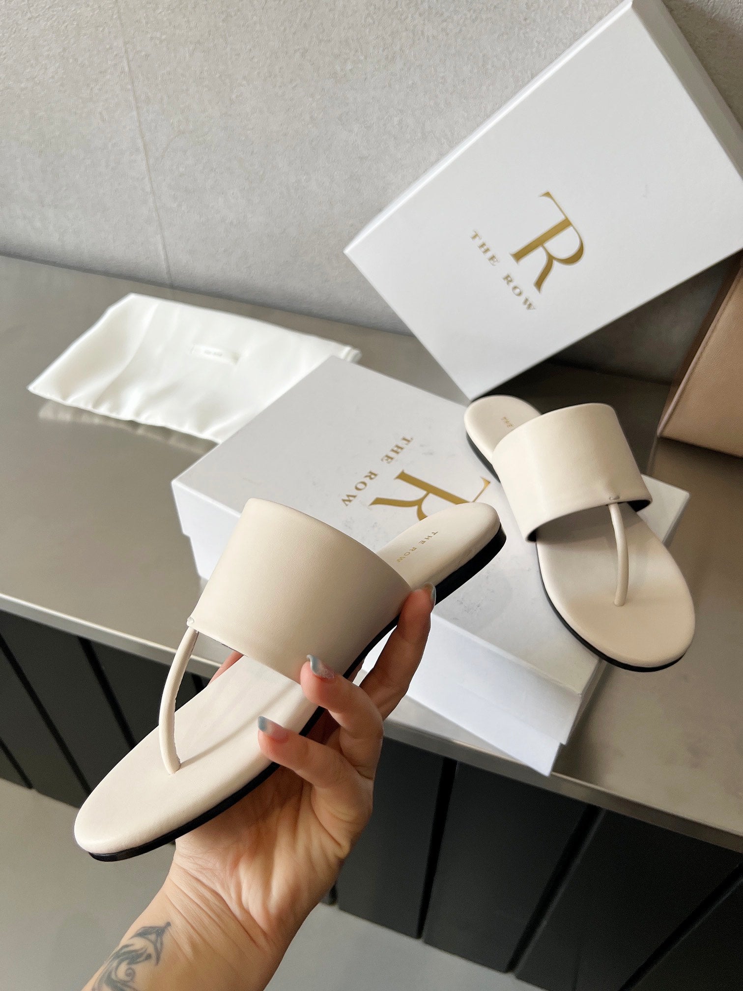 THE ROW 26S FLAT THONG SANDALS IN WHITE CALFSKIN