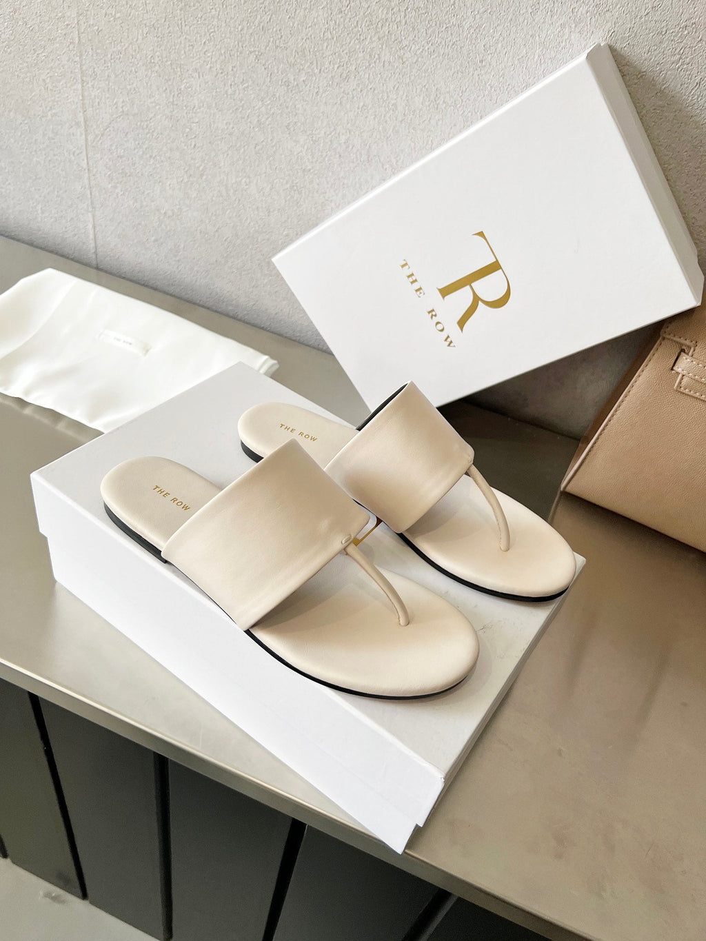 THE ROW 26S FLAT THONG SANDALS IN WHITE CALFSKIN