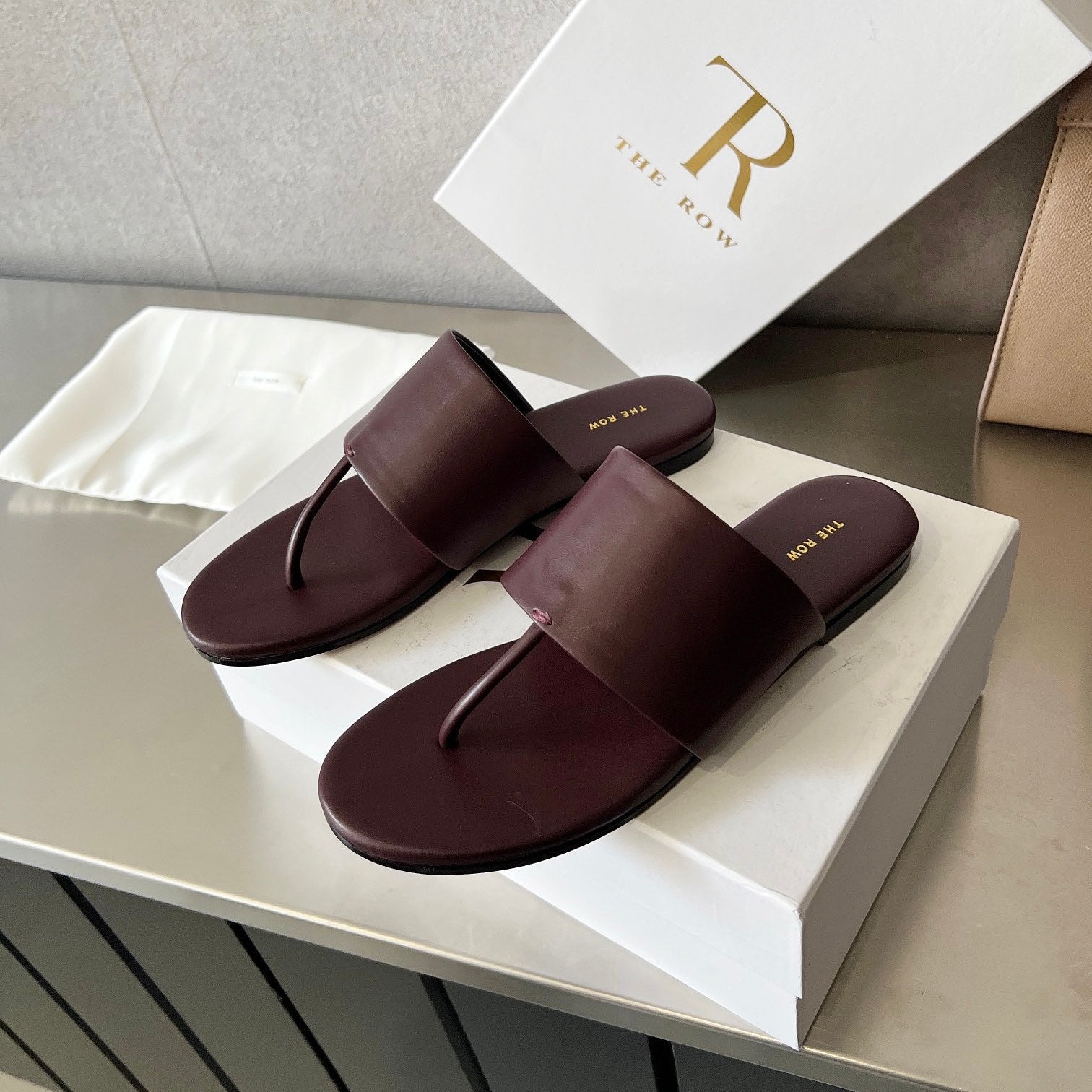 THE ROW 26S FLAT THONG SANDALS IN BURGUNDY RED CALFSKIN