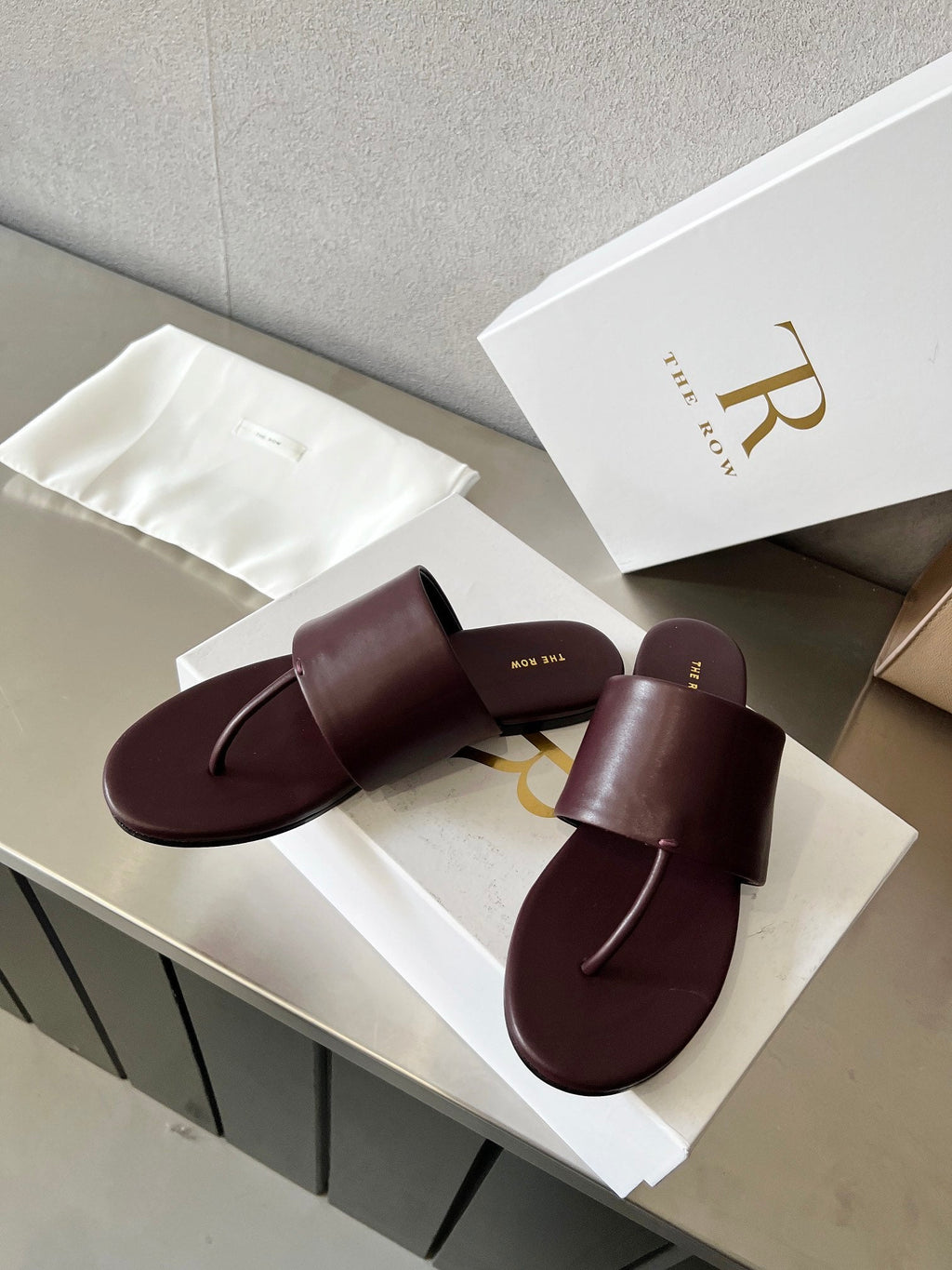 THE ROW 26S FLAT THONG SANDALS IN BURGUNDY RED CALFSKIN