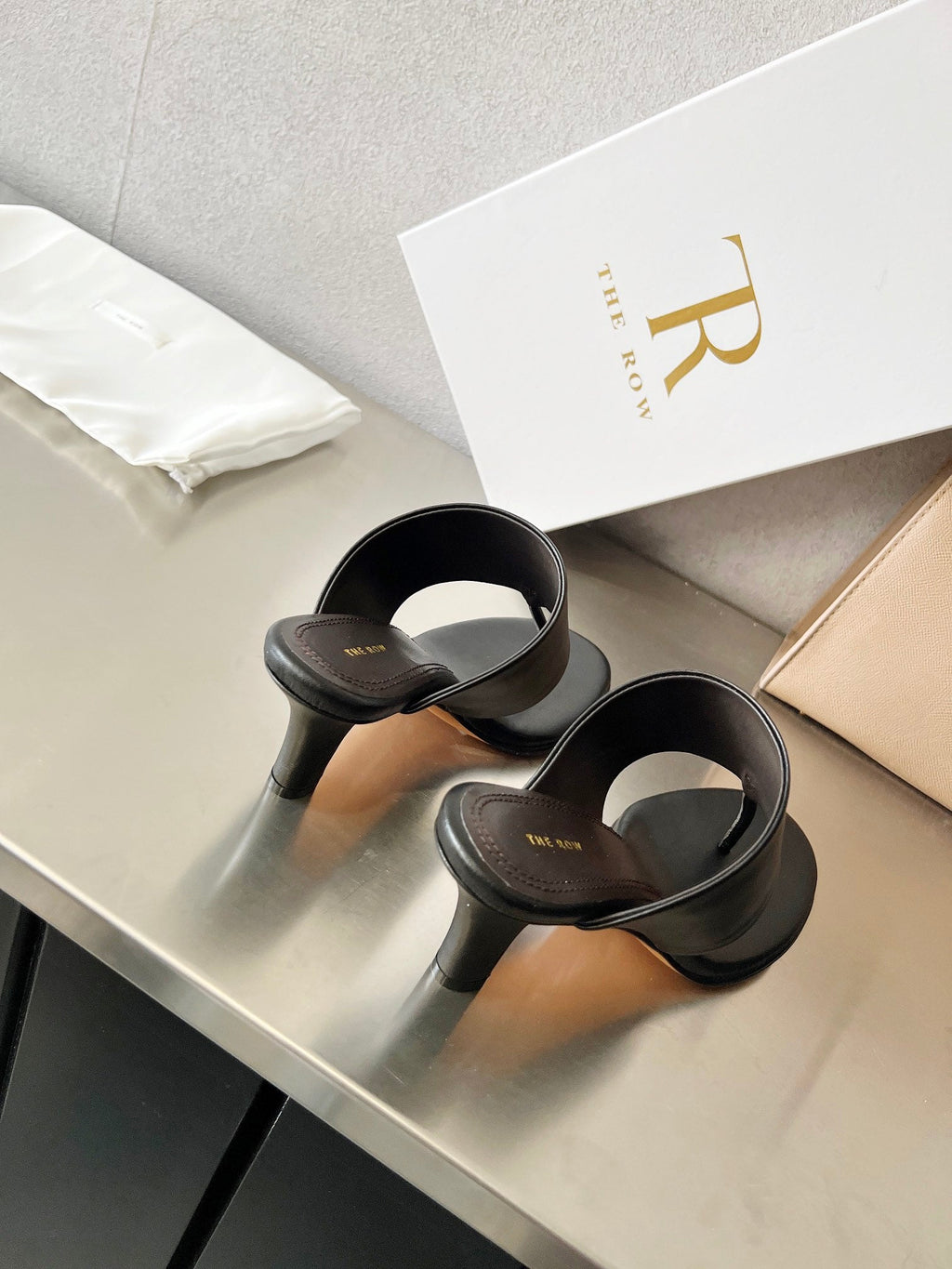 THE ROW 26S HEELED THONG MULES 60MM IN BLACK CALFSKIN