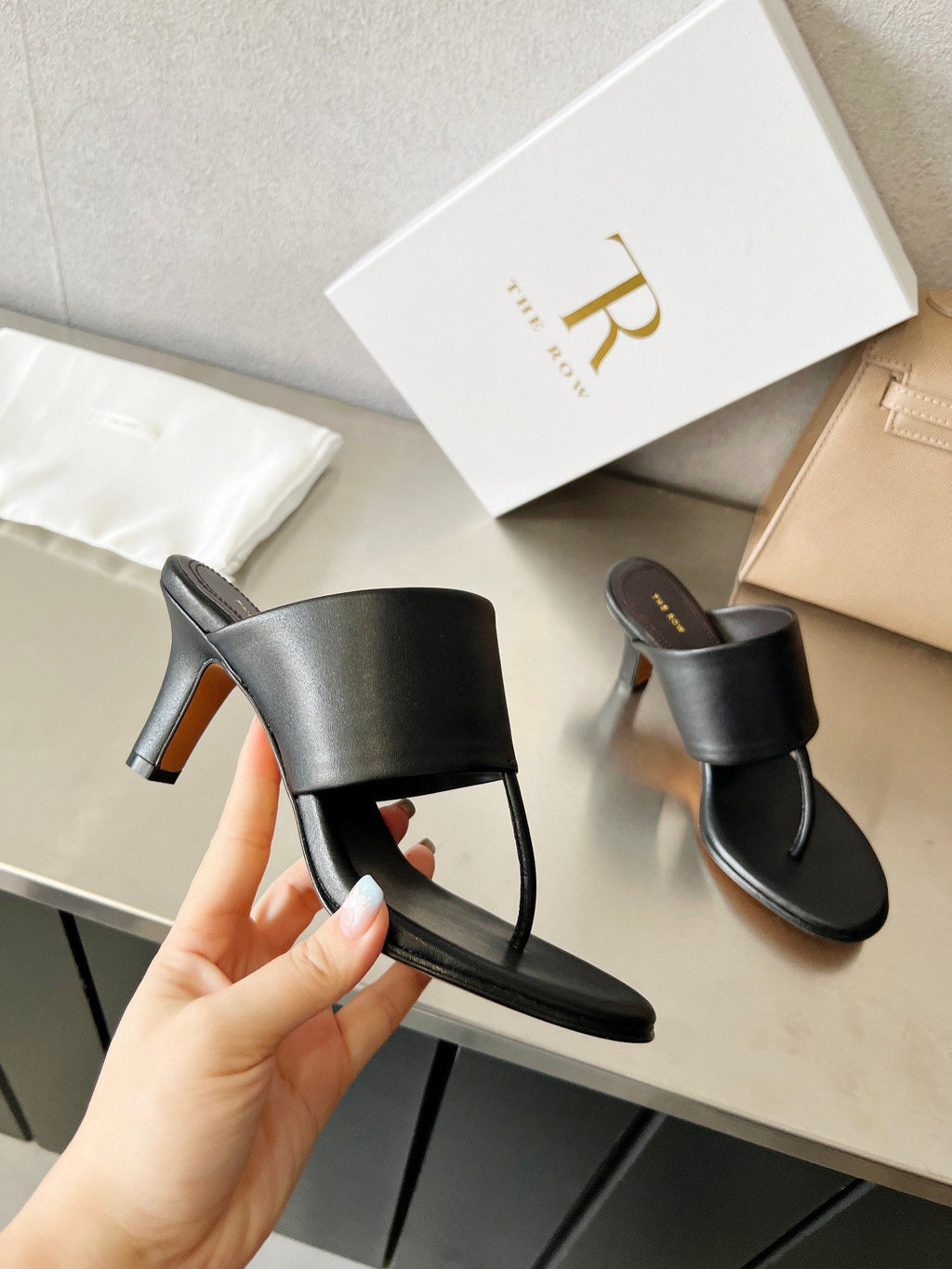 THE ROW 26S HEELED THONG MULES 60MM IN BLACK CALFSKIN