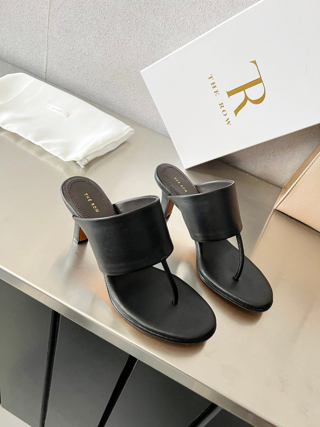 THE ROW 26S HEELED THONG MULES 60MM IN BLACK CALFSKIN