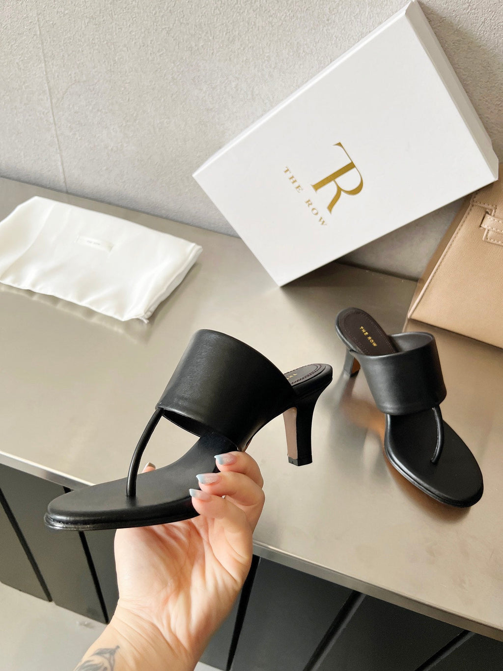 THE ROW 26S HEELED THONG MULES 60MM IN BLACK CALFSKIN