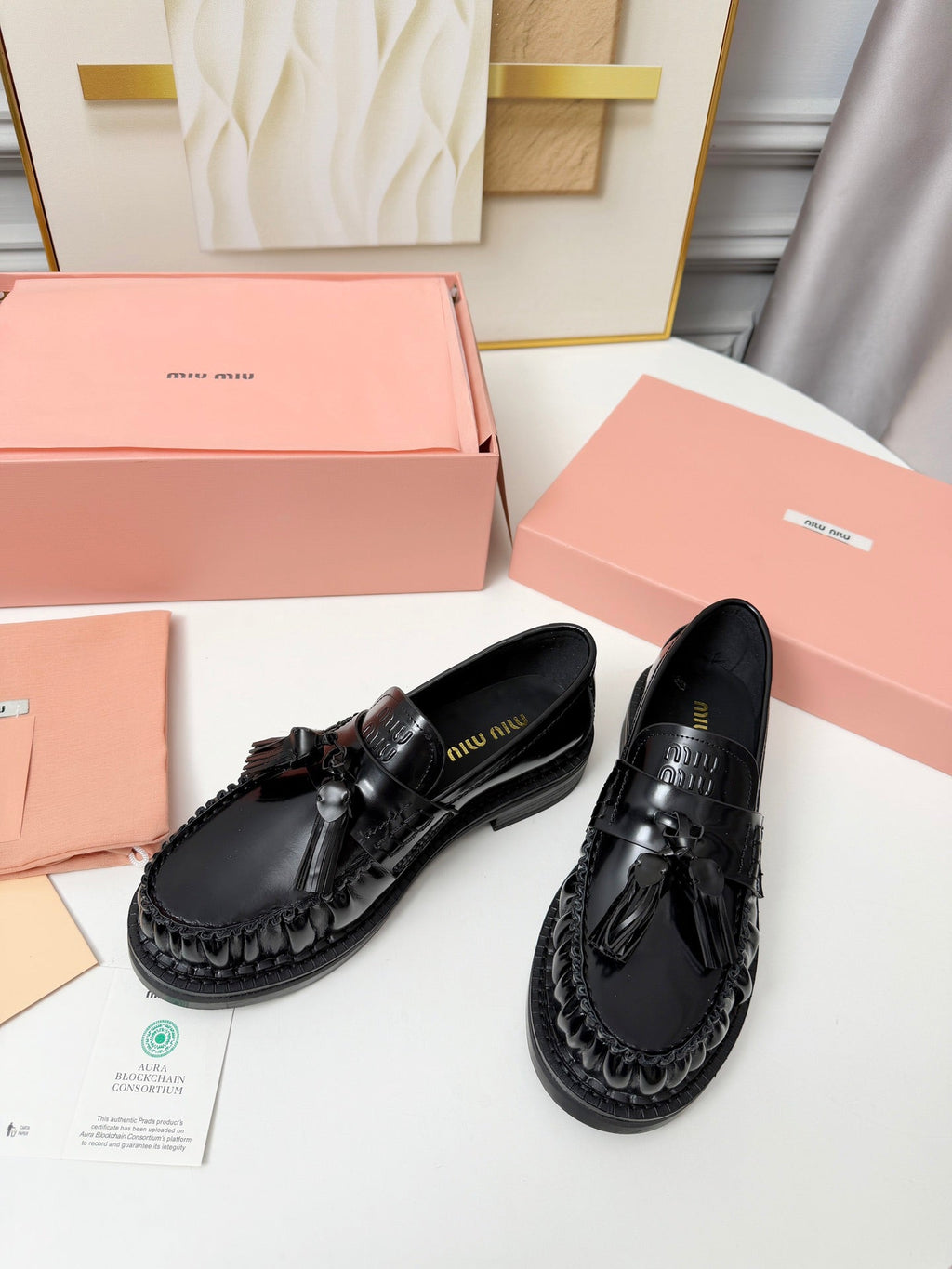 MIUMIU 26S TASSEL LOAFERS IN BLACK CALFSKIN