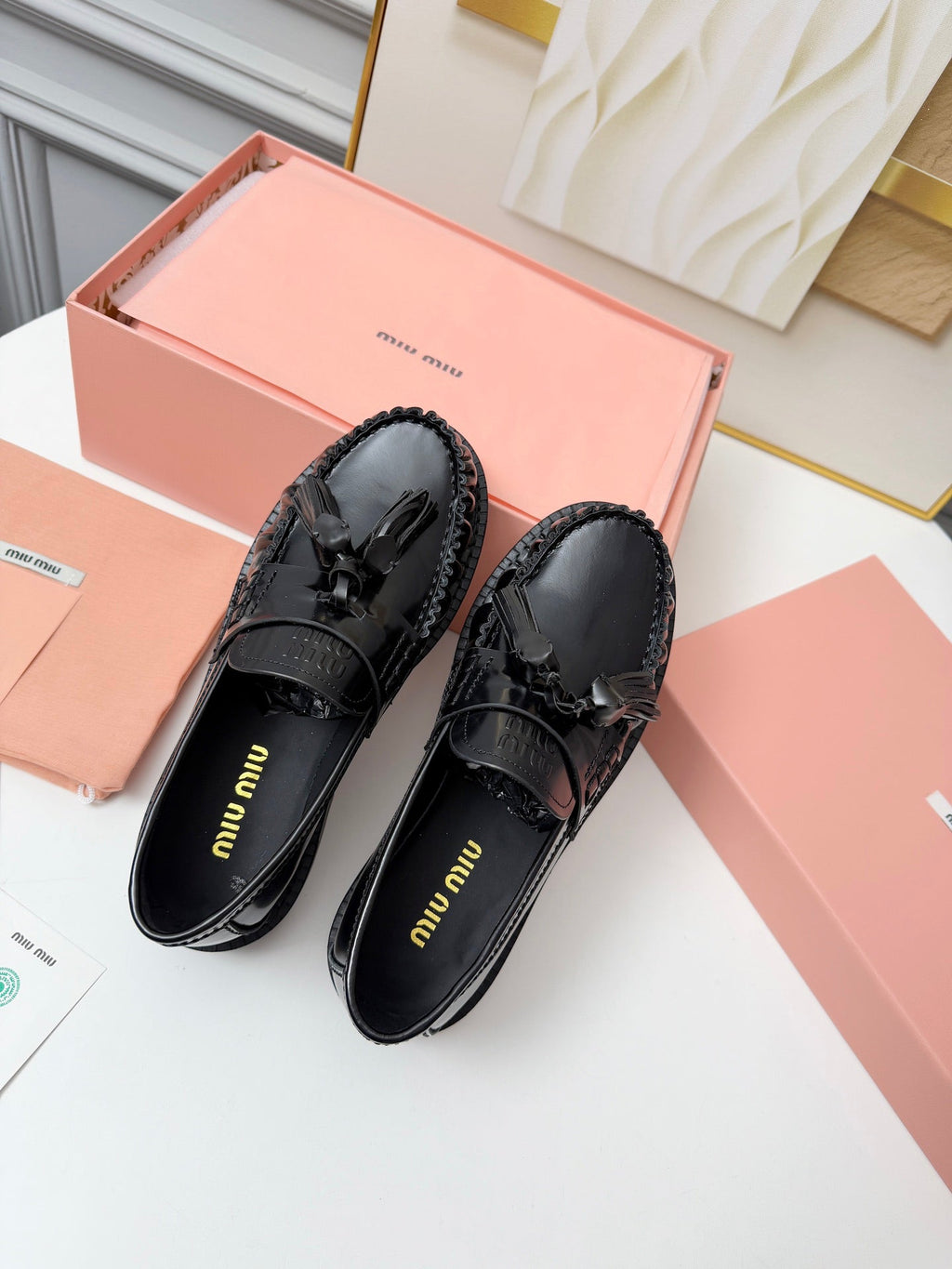 MIUMIU 26S TASSEL LOAFERS IN BLACK CALFSKIN