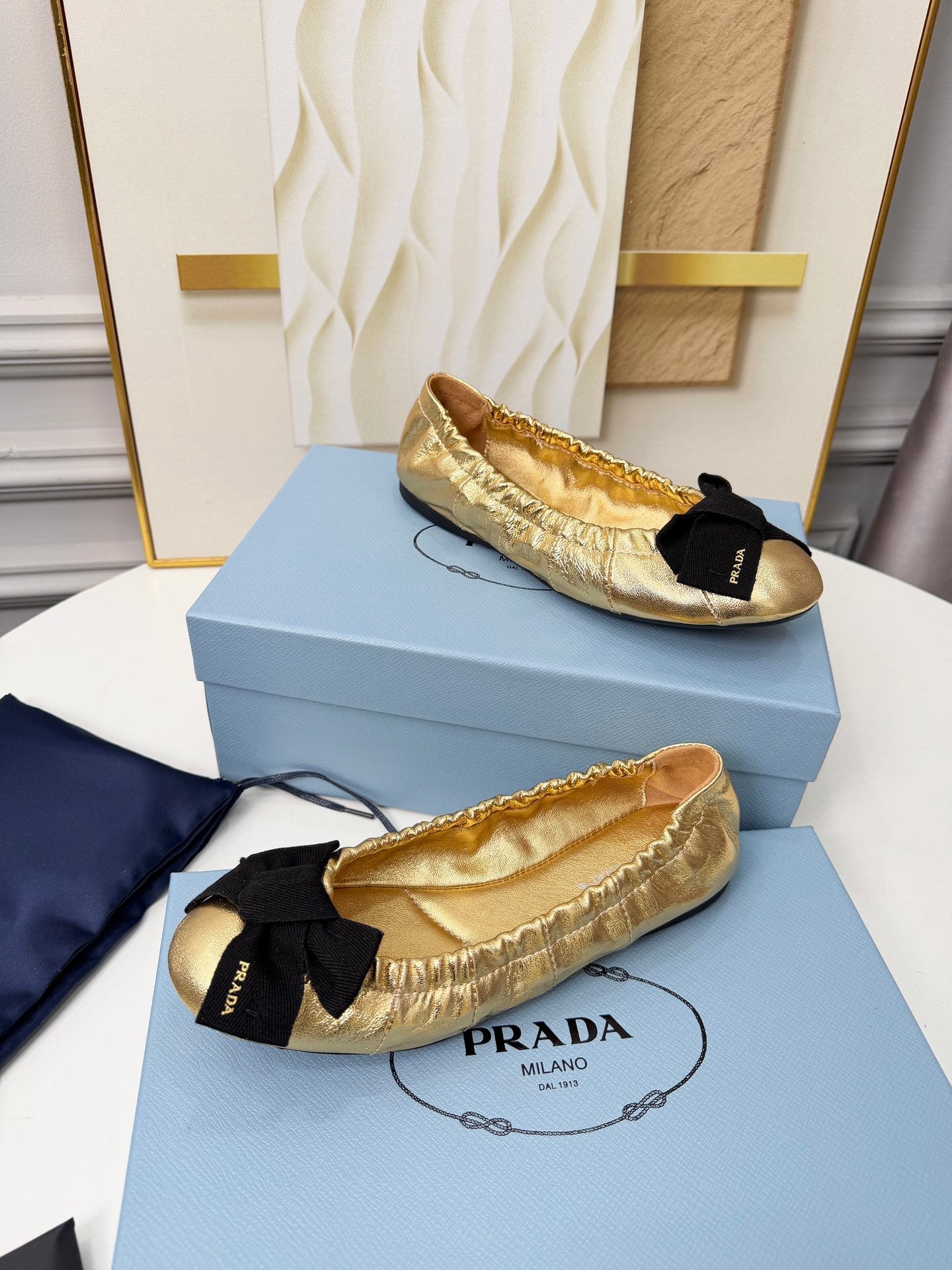 PRADA 26S BALLERINA FLATS IN GOLD CALFSKIN WITH BOW