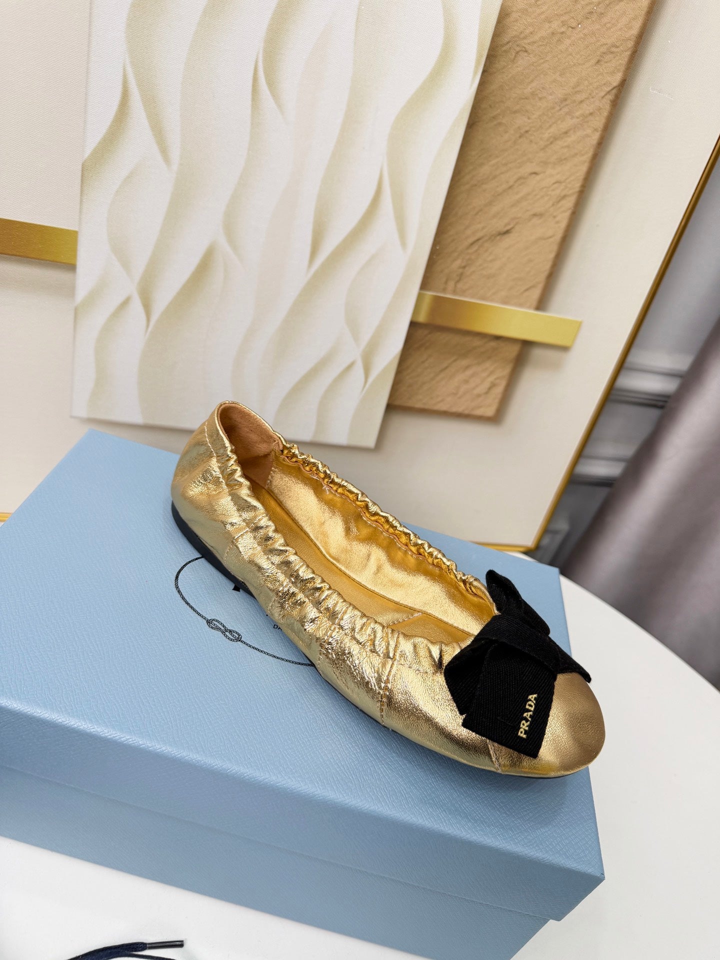 PRADA 26S BALLERINA FLATS IN GOLD CALFSKIN WITH BOW