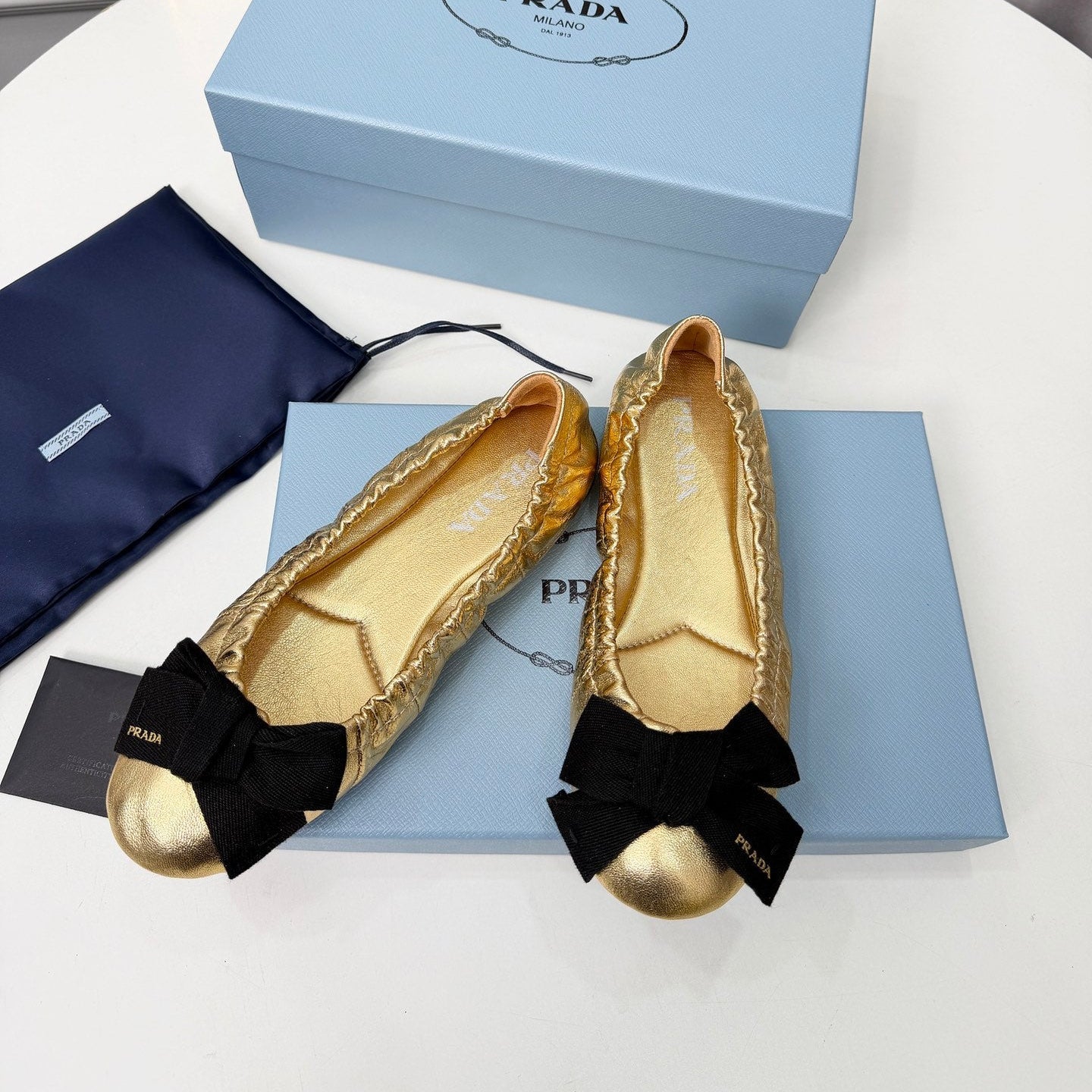 PRADA 26S BALLERINA FLATS IN GOLD CALFSKIN WITH BOW