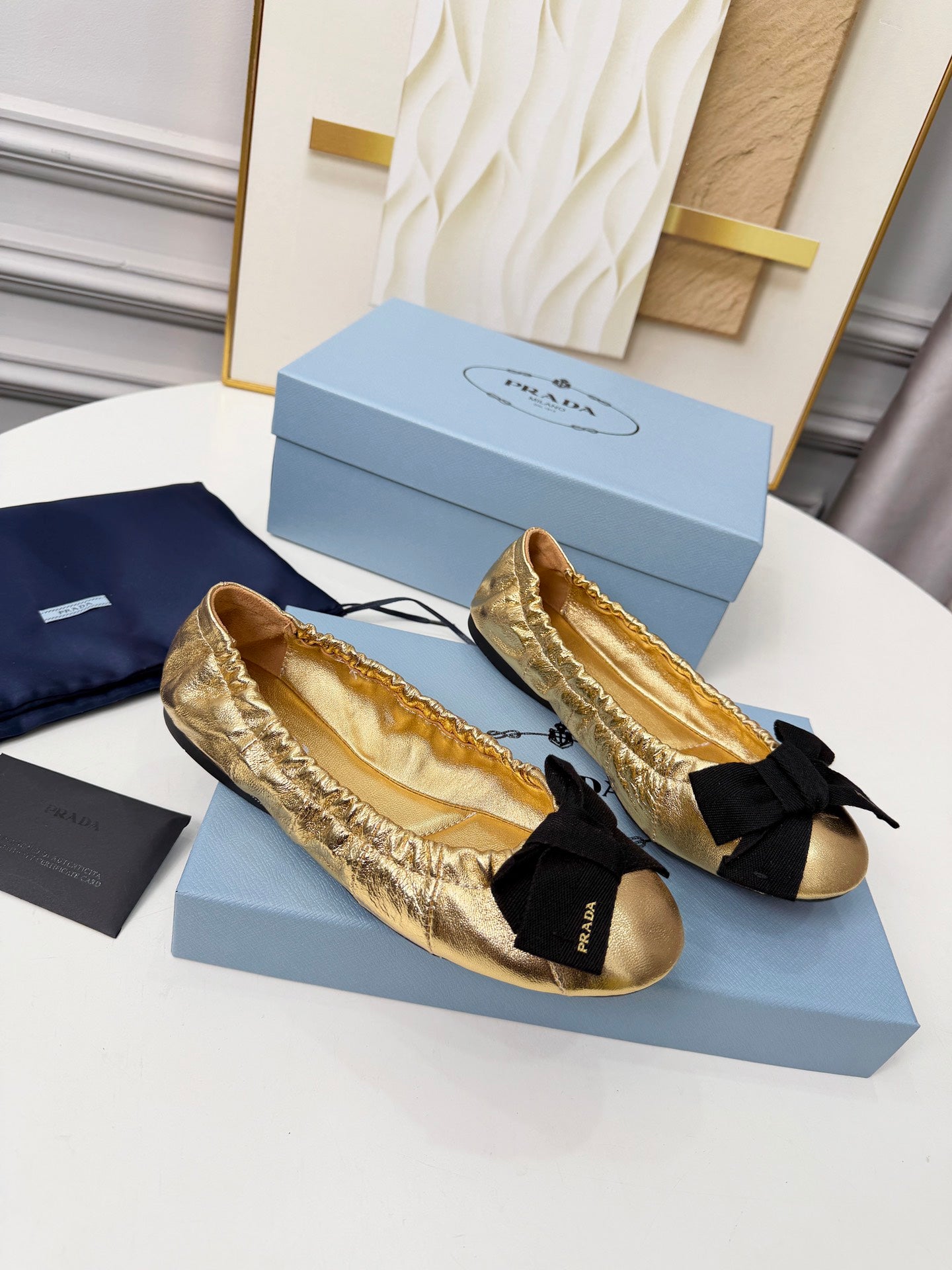 PRADA 26S BALLERINA FLATS IN GOLD CALFSKIN WITH BOW