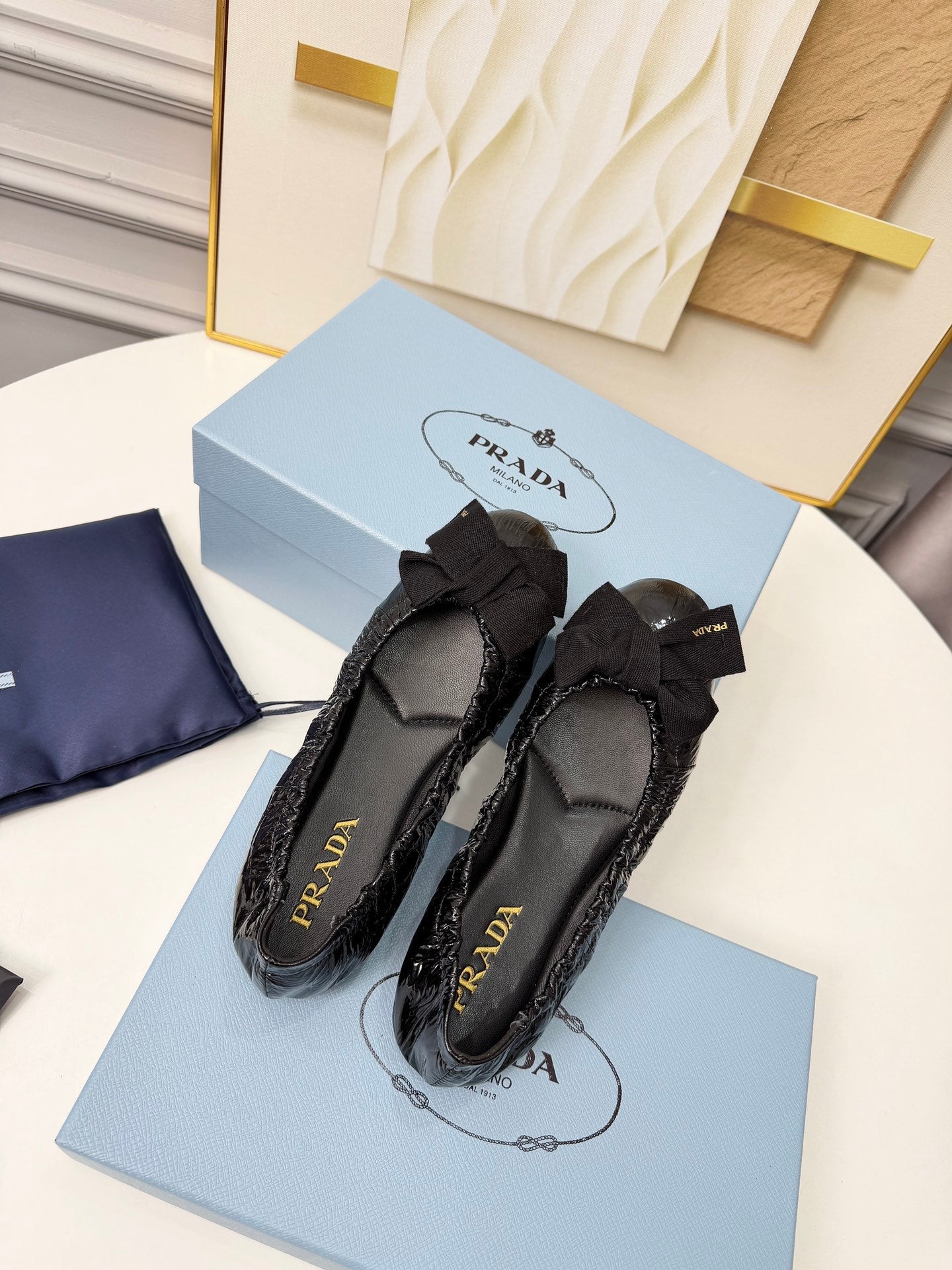 PRADA 26S BALLERINA FLATS IN BLACK CALFSKIN WITH BOW