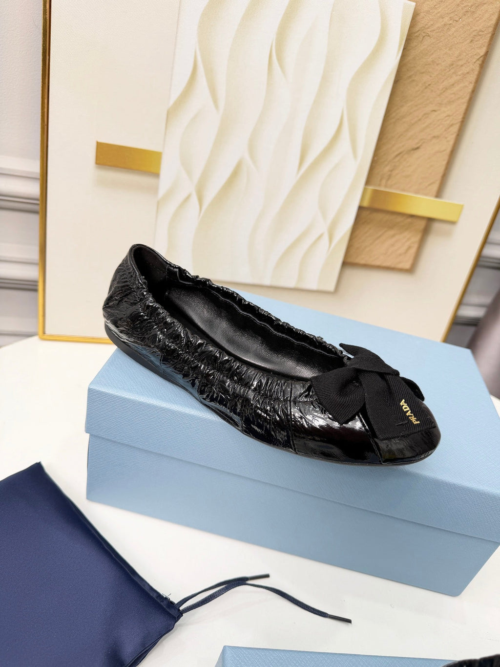 PRADA 26S BALLERINA FLATS IN BLACK CALFSKIN WITH BOW
