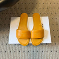 CELINE 26S FLAT SLIDES IN HONEY YELLOW LAMBSKIN