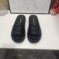 CHANEL 26S QUILTED SLIDE SANDALS IN BLACK CALFSKIN