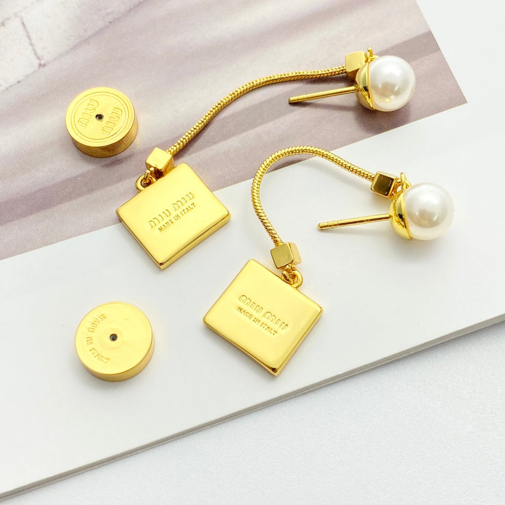 MIUMIU 26S PEARL BAR DROP LOGO EARRINGS IN GOLD TONE METAL 629846