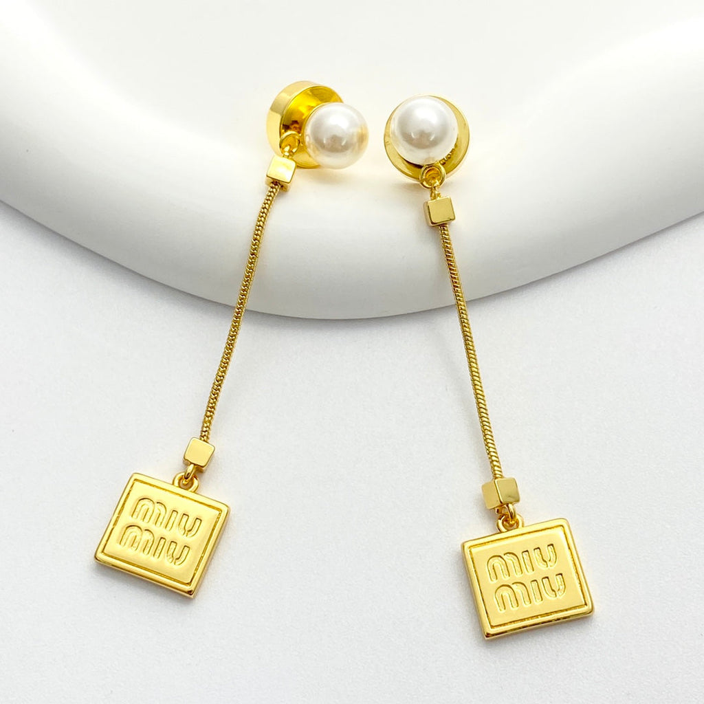 MIUMIU 26S PEARL BAR DROP LOGO EARRINGS IN GOLD TONE METAL 629846