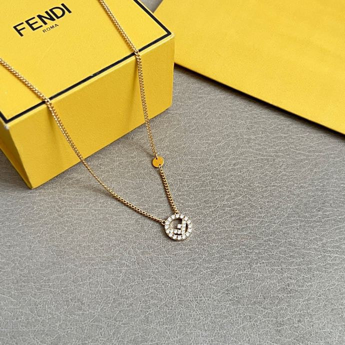 FENDI 26S FF CRYSTAL PENDANT NECKLACE IN GOLD TONE METAL 629953