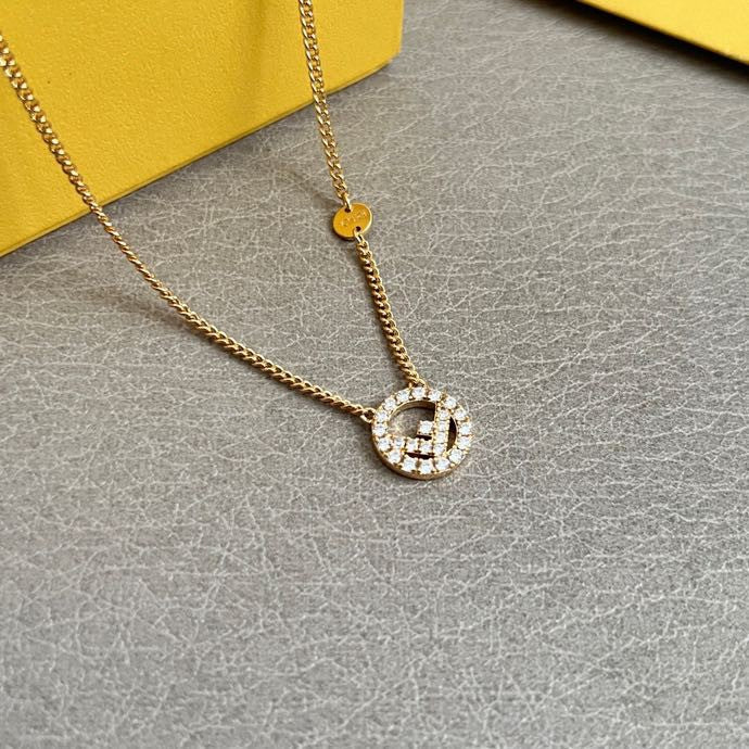 FENDI 26S FF CRYSTAL PENDANT NECKLACE IN GOLD TONE METAL 629953