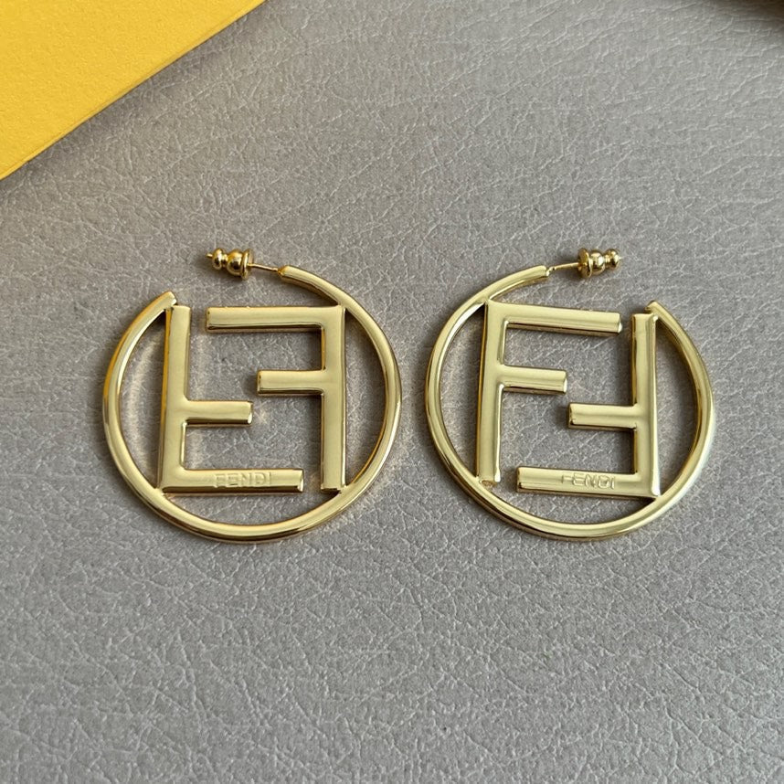FENDI 26S FF LOGO HOOP EARRINGS IN GOLD TONE METAL 629960
