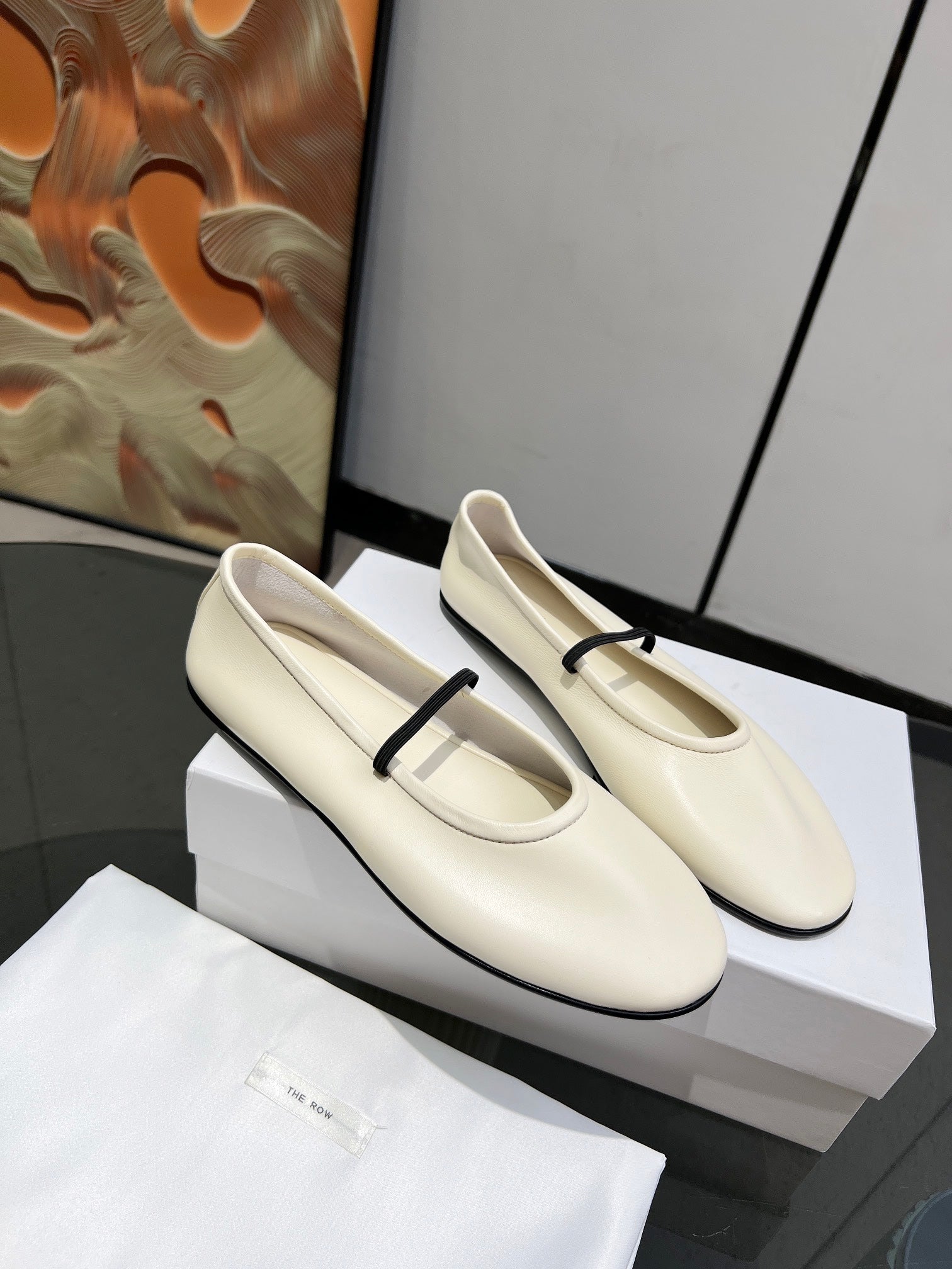 THE ROW 26S BALLET FLATS IN IVORY WHITE CALFSKIN