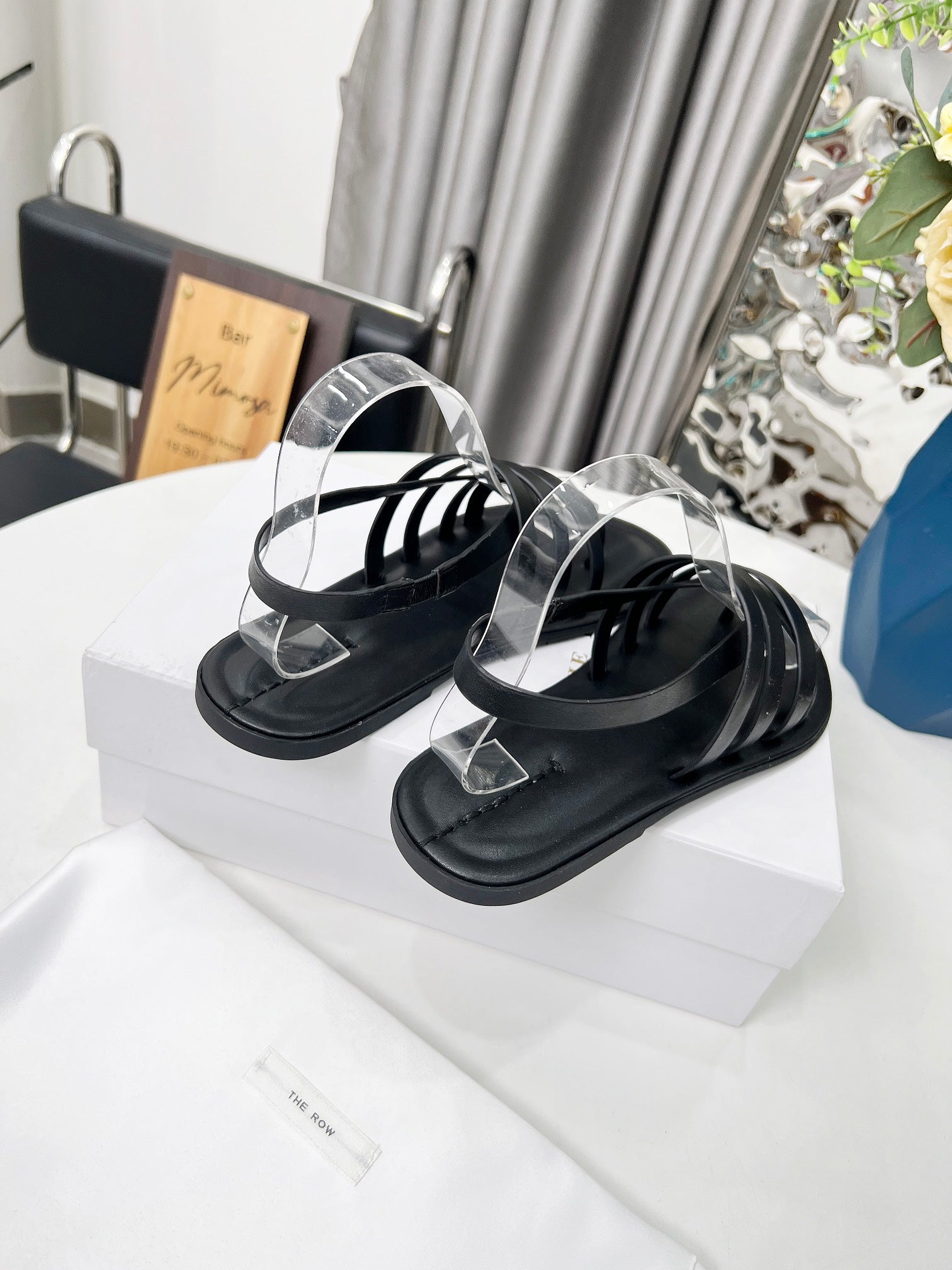 THE ROW 26S MINIMAL STRAPPY FLAT SANDALS IN BLACK CALFSKIN