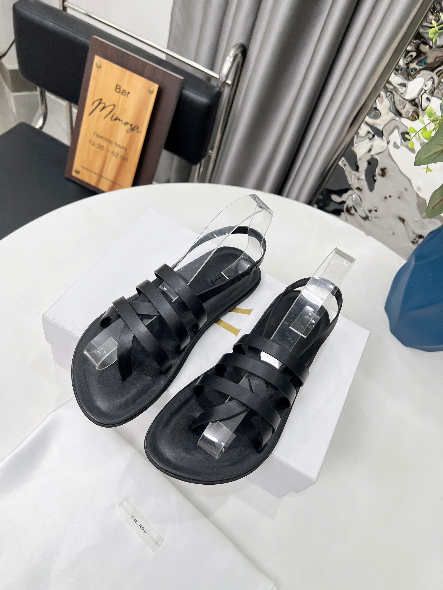 THE ROW 26S MINIMAL STRAPPY FLAT SANDALS IN BLACK CALFSKIN